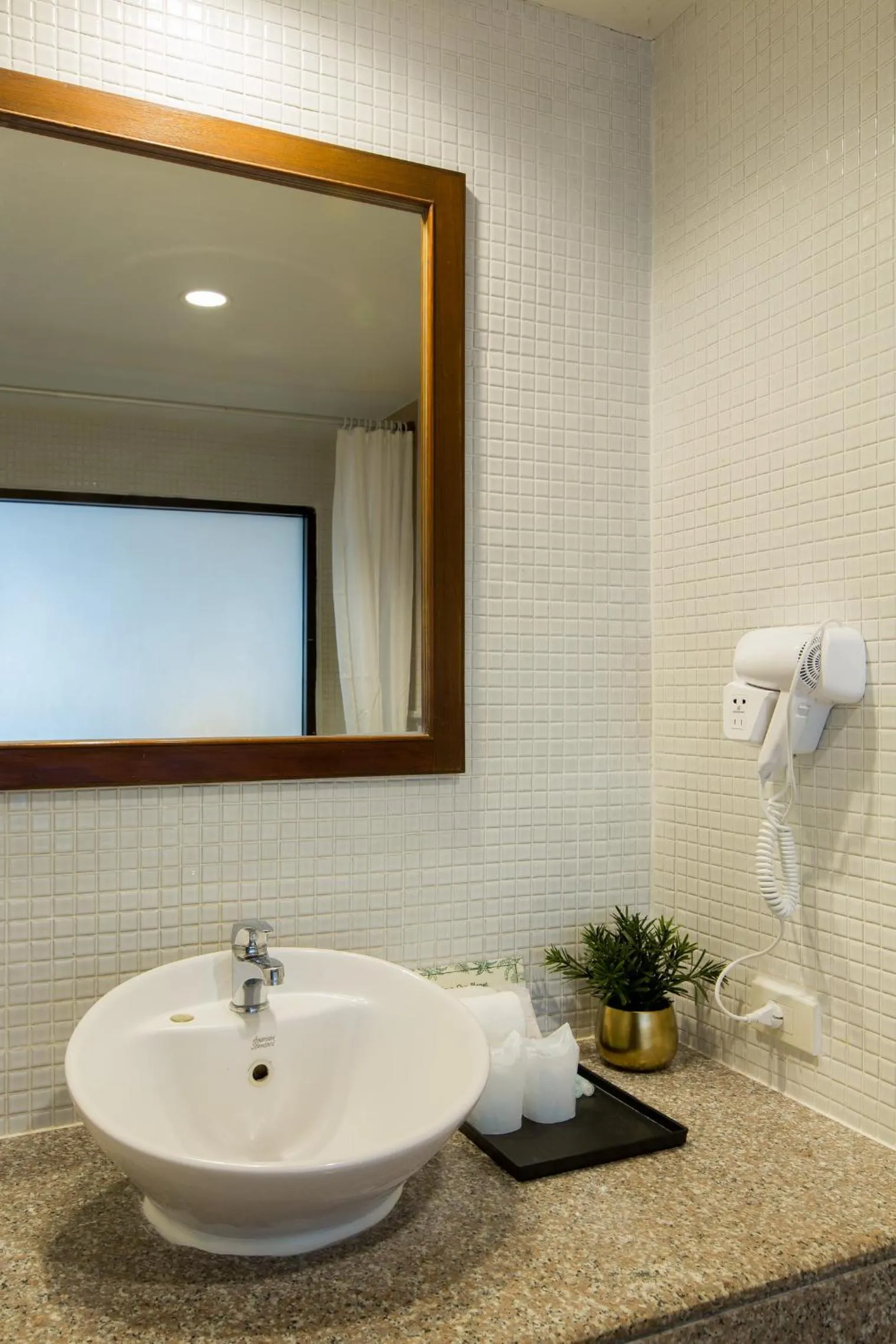 Bathroom in Coconut Village Resort Phuket - SHA Extra Plus