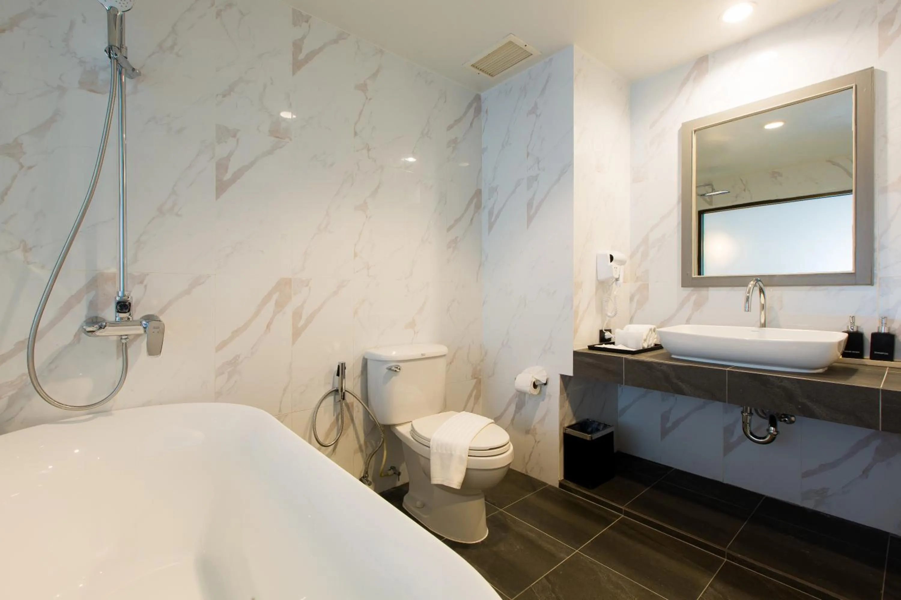 Shower in Coconut Village Resort Phuket - SHA Extra Plus