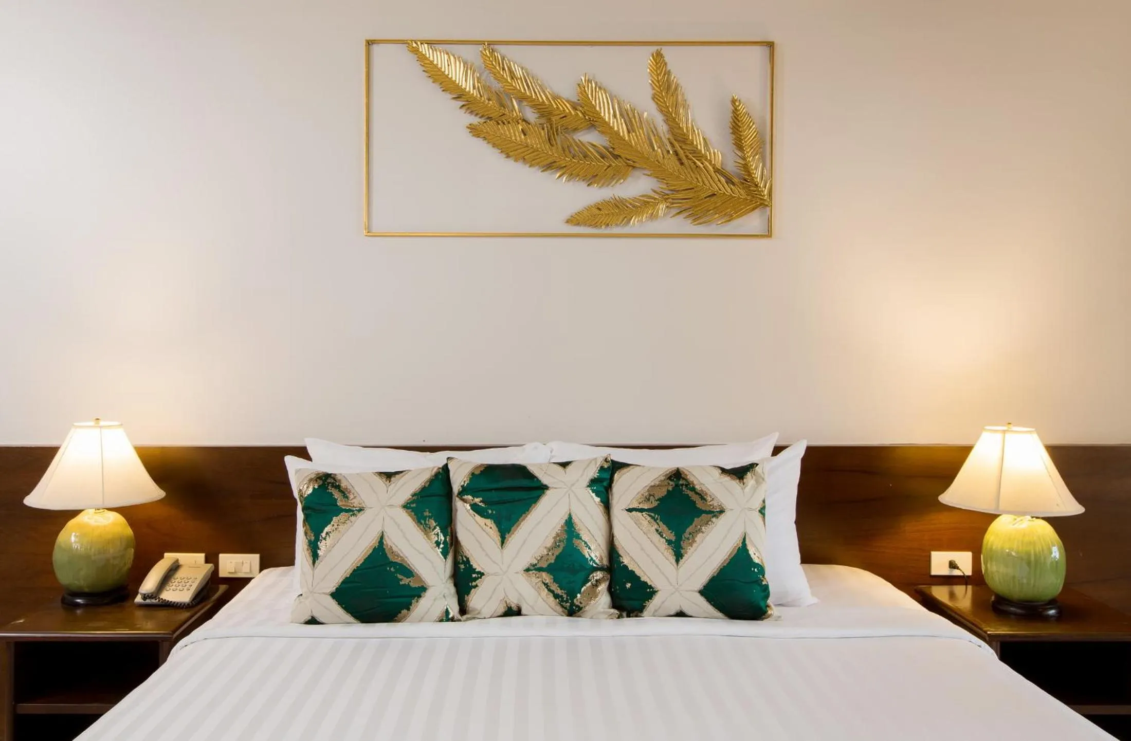 Bed in Coconut Village Resort Phuket - SHA Extra Plus