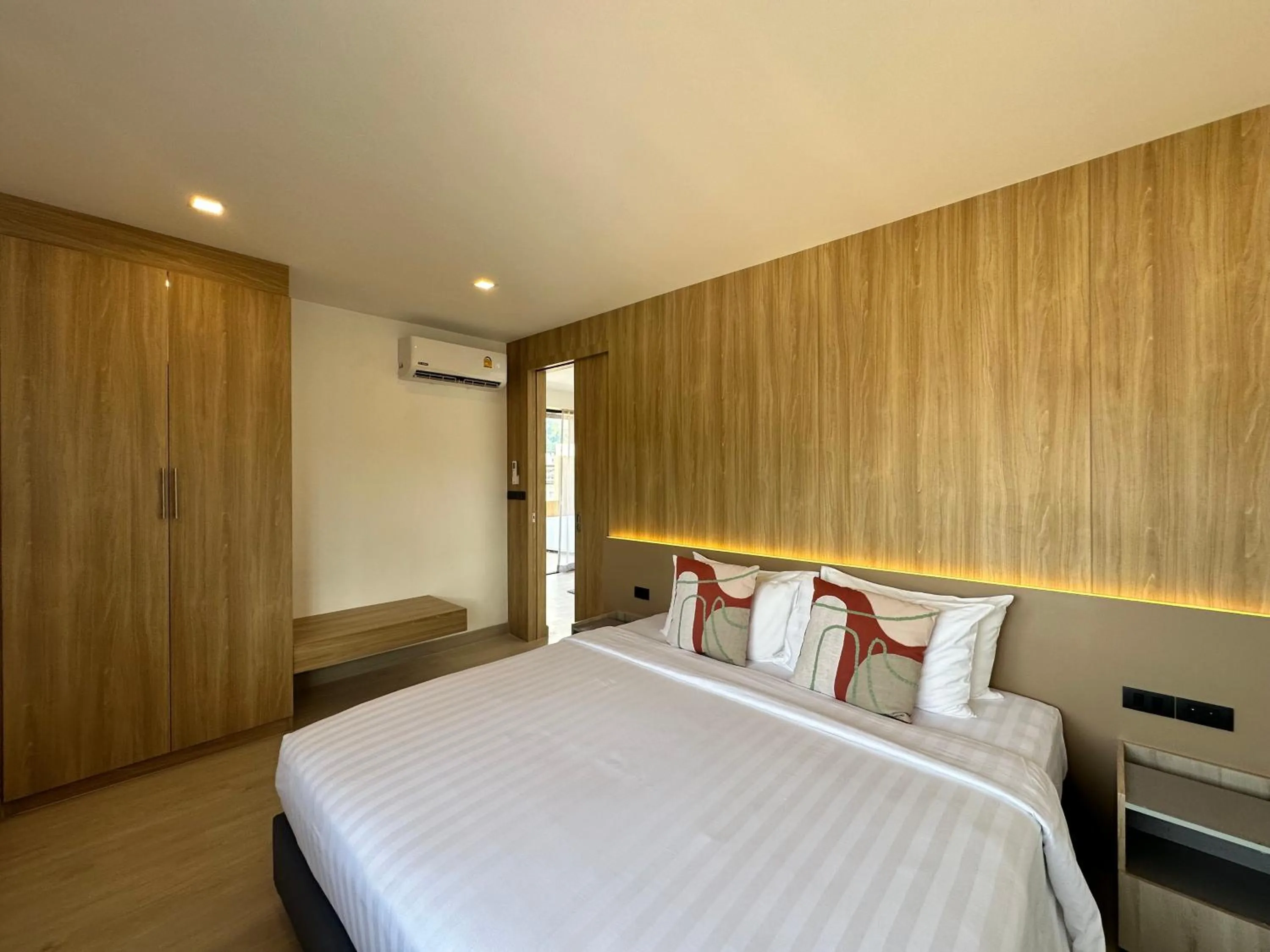 Bedroom, Bed in Coconut Village Resort Phuket - SHA Extra Plus