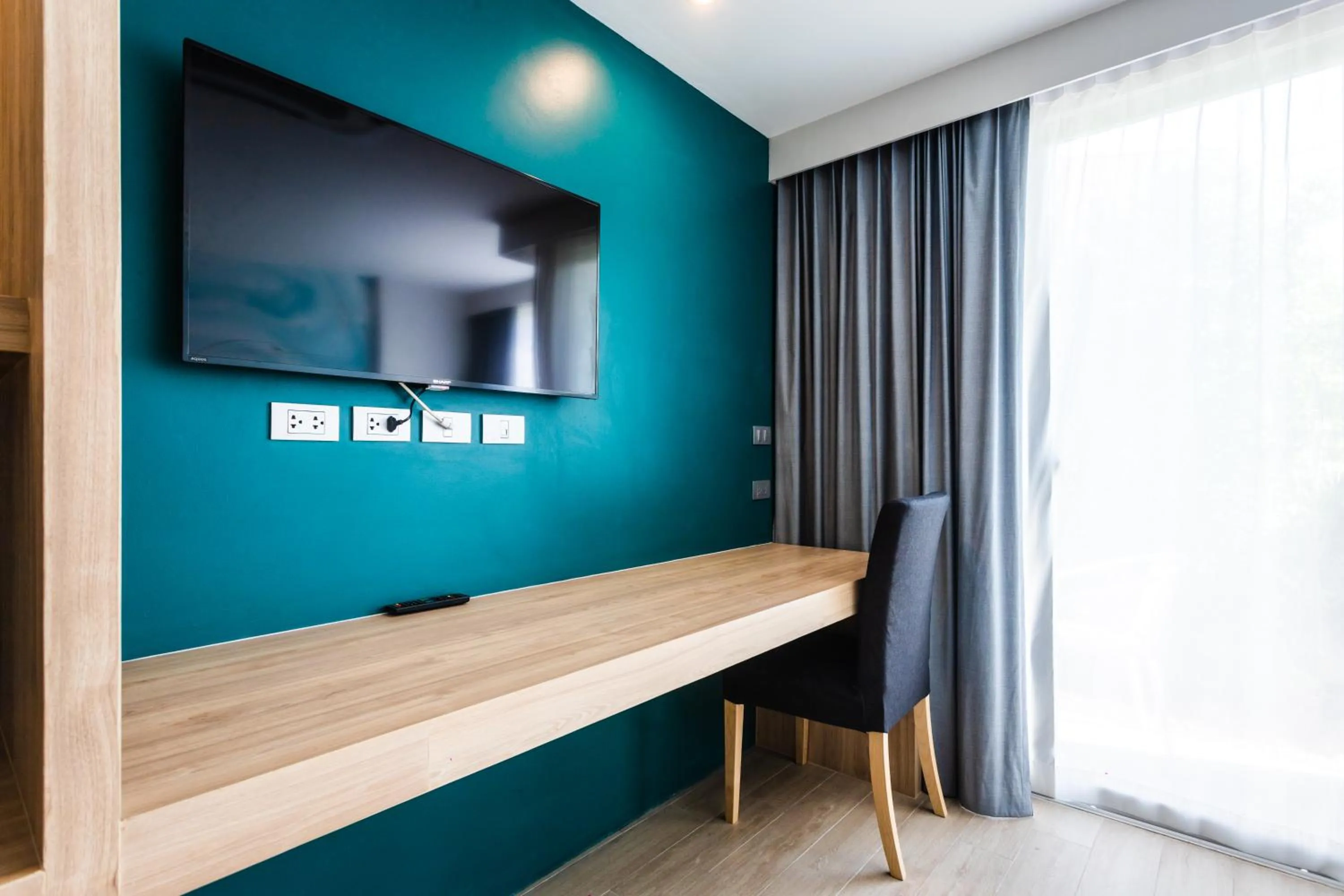 TV and multimedia in Coconut Village Resort Phuket - SHA Extra Plus