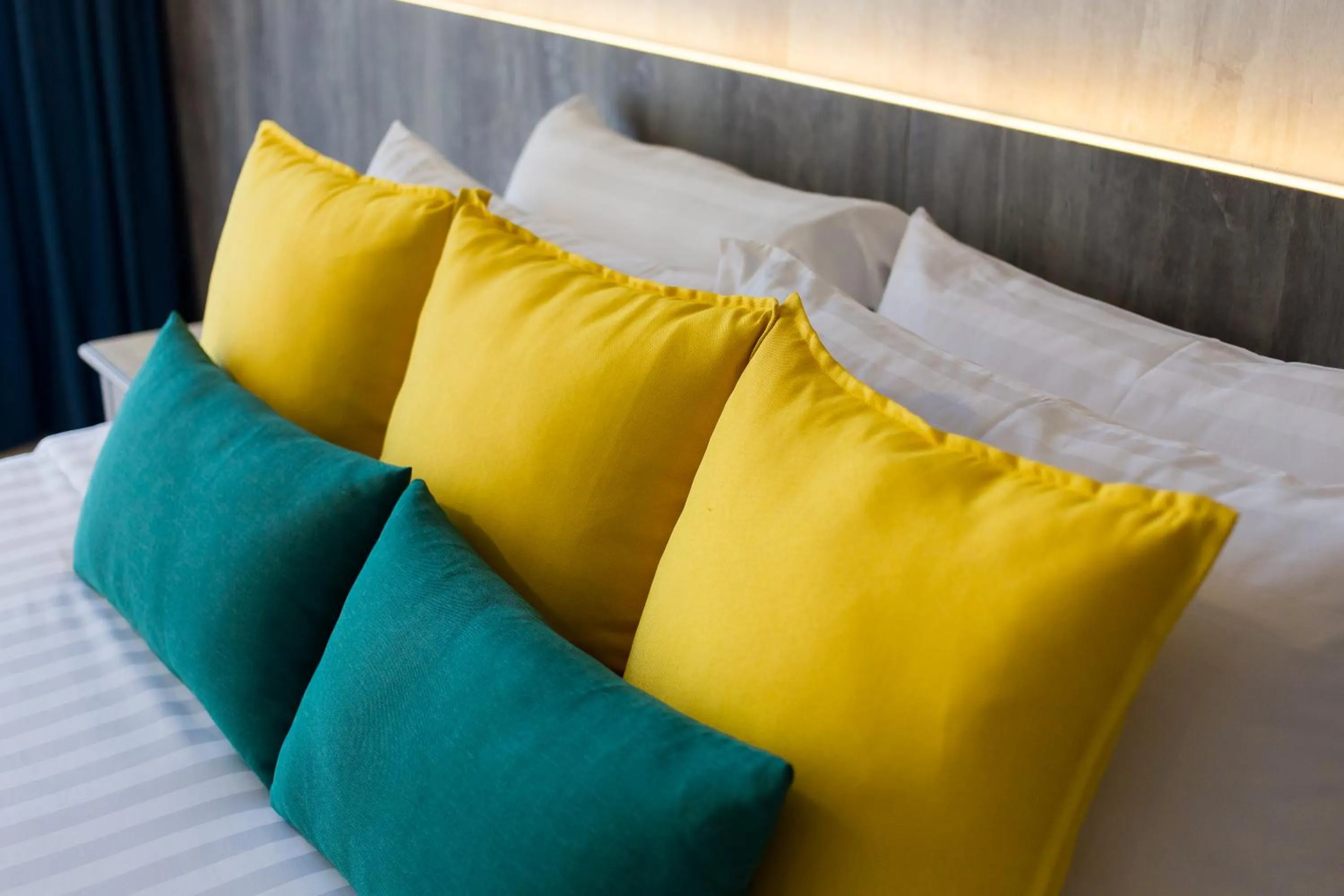 Bed in Coconut Village Resort Phuket - SHA Extra Plus