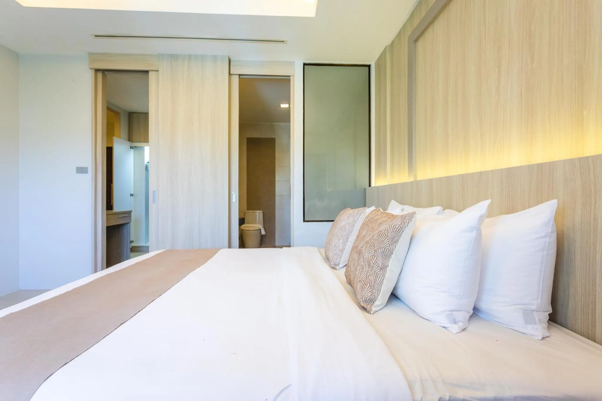 Bedroom, Bed in Coconut Village Resort Phuket - SHA Extra Plus