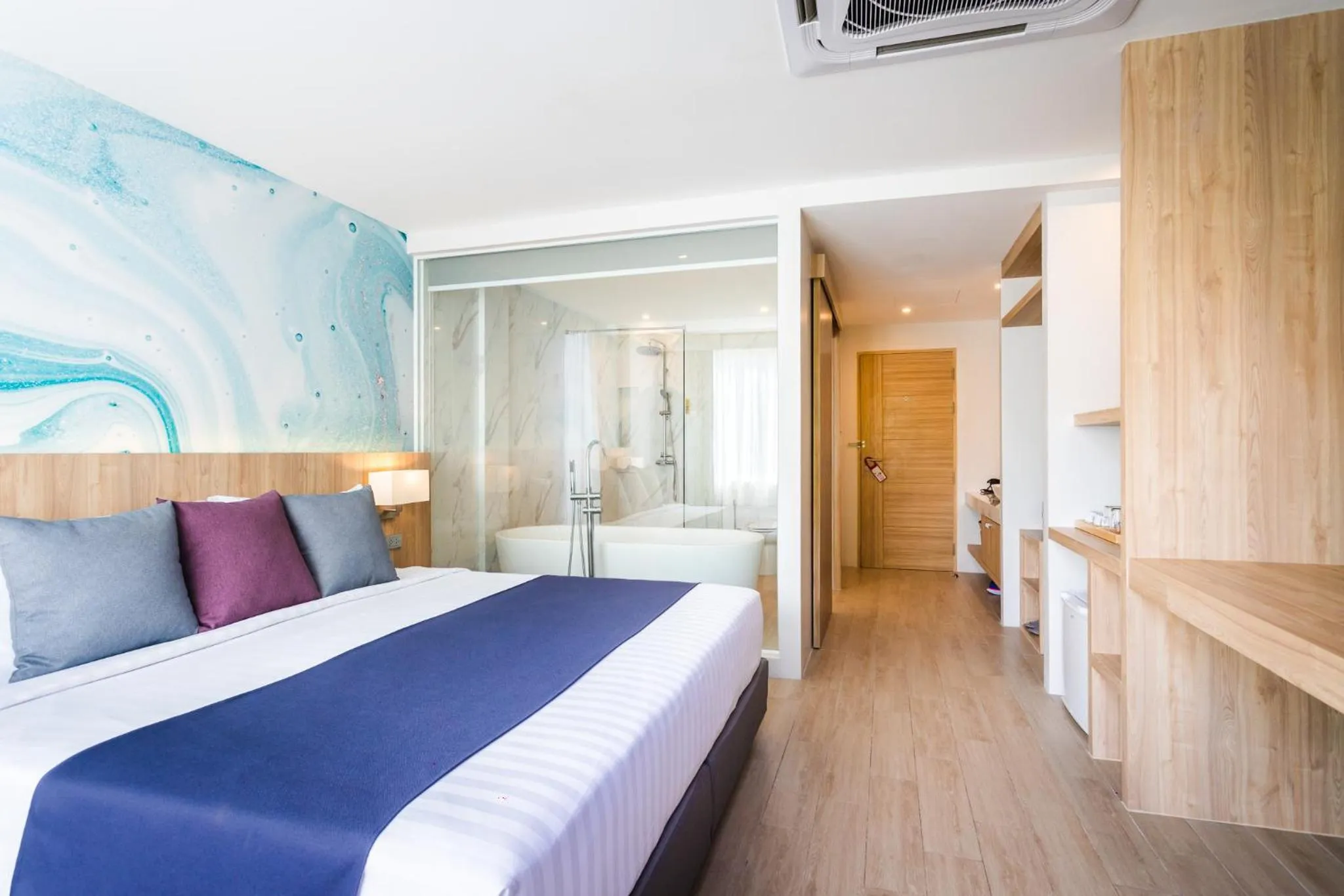 Bed in Coconut Village Resort Phuket - SHA Extra Plus