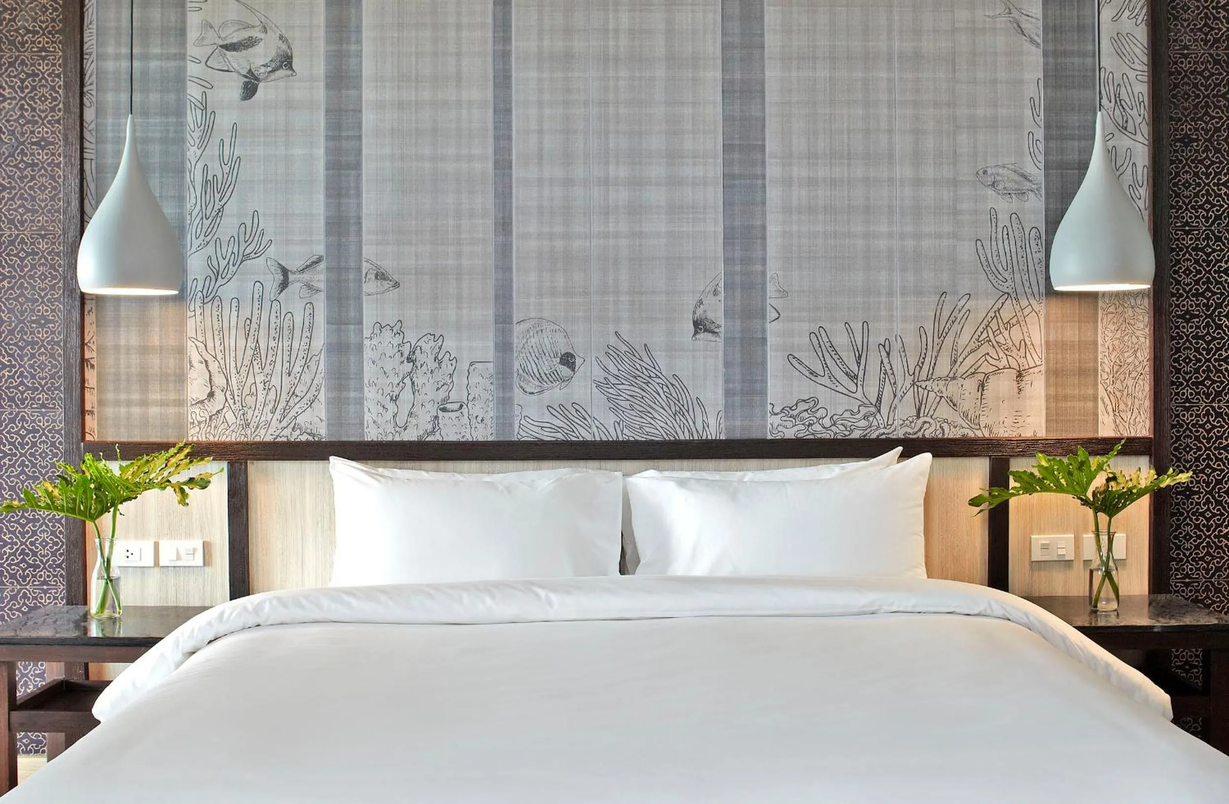 Bed in Sareeraya Villas & Suites