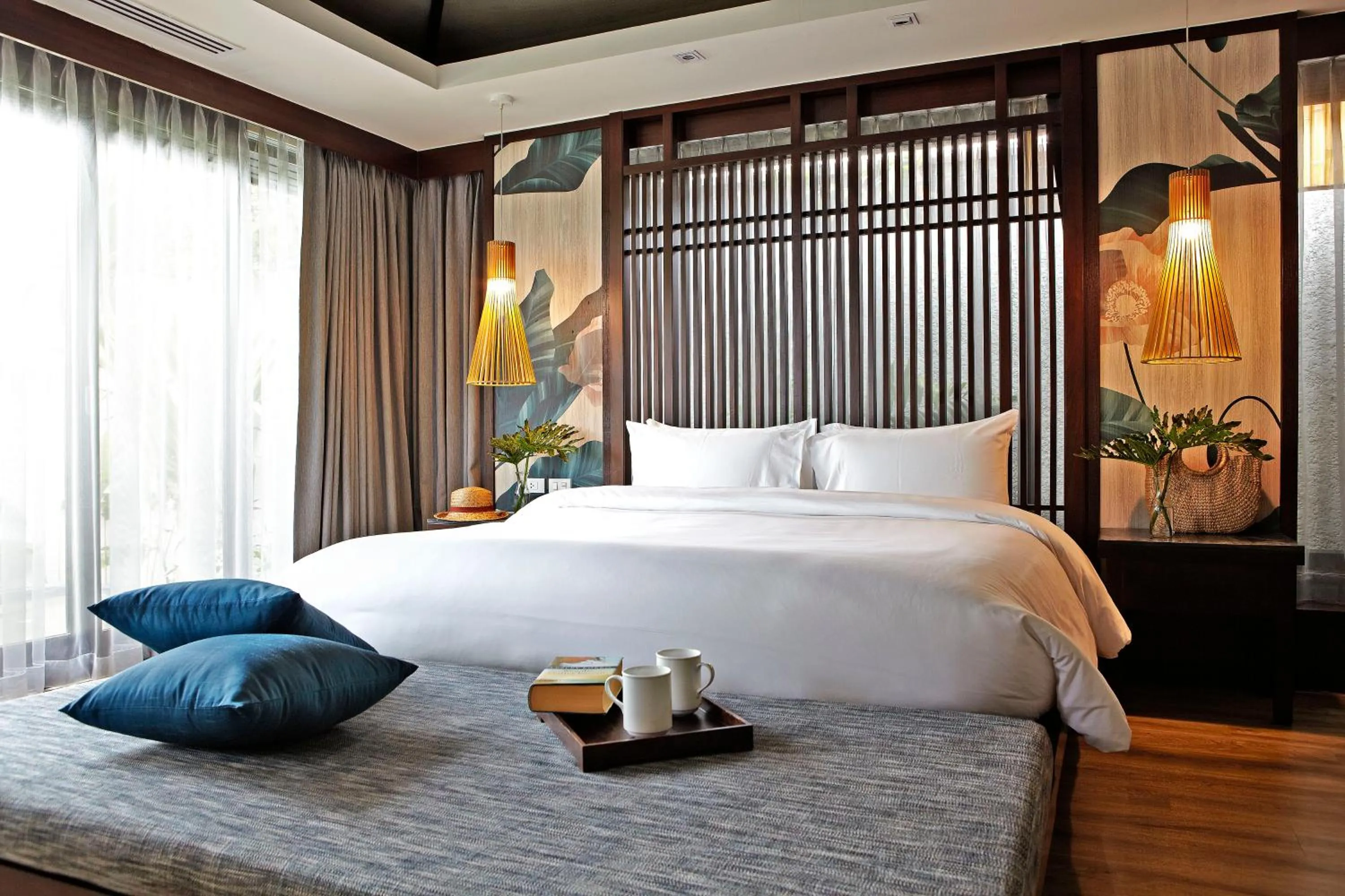 Bed in Sareeraya Villas & Suites