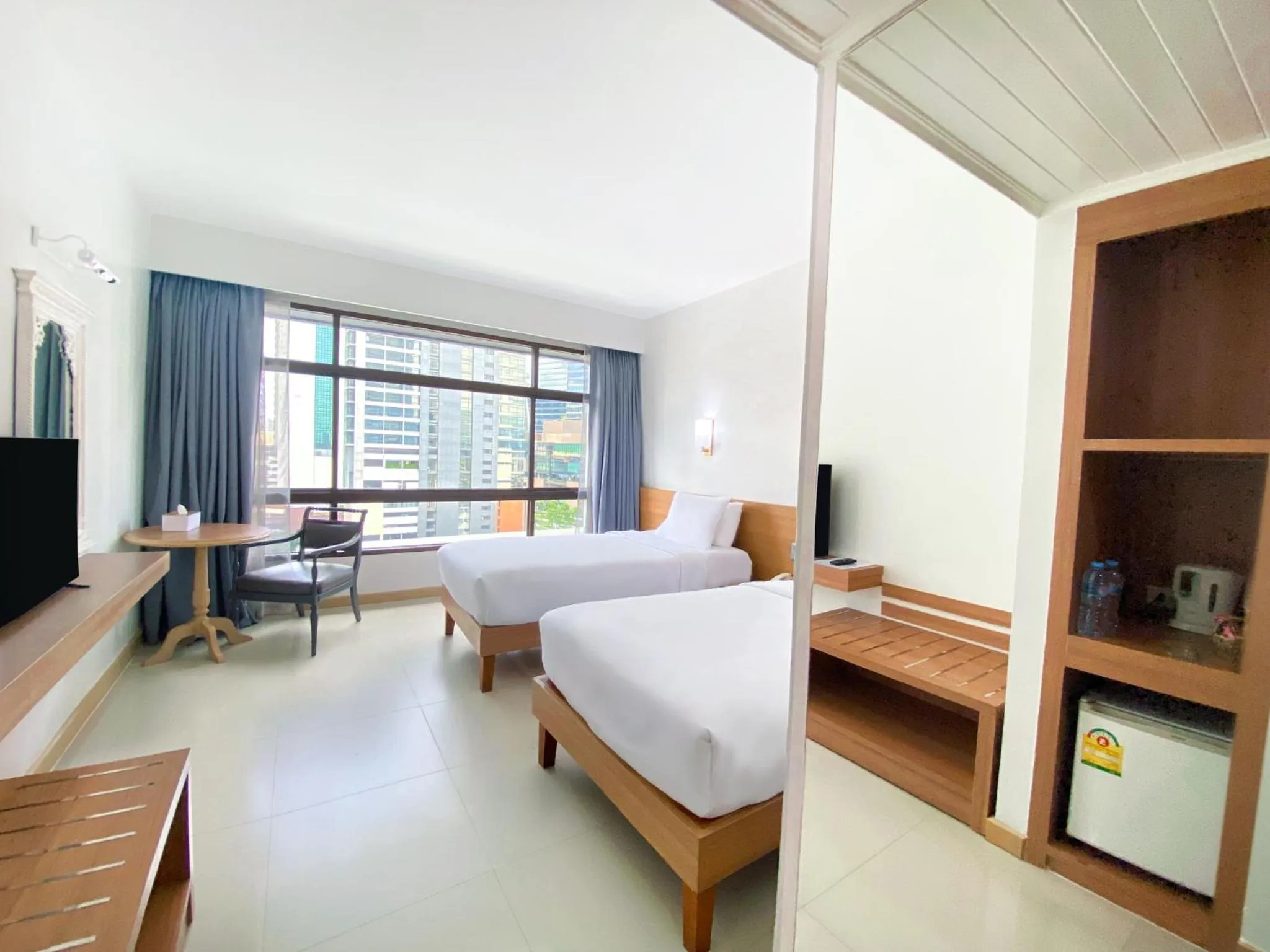 Bed in Pinnacle Lumpini Park Hotel