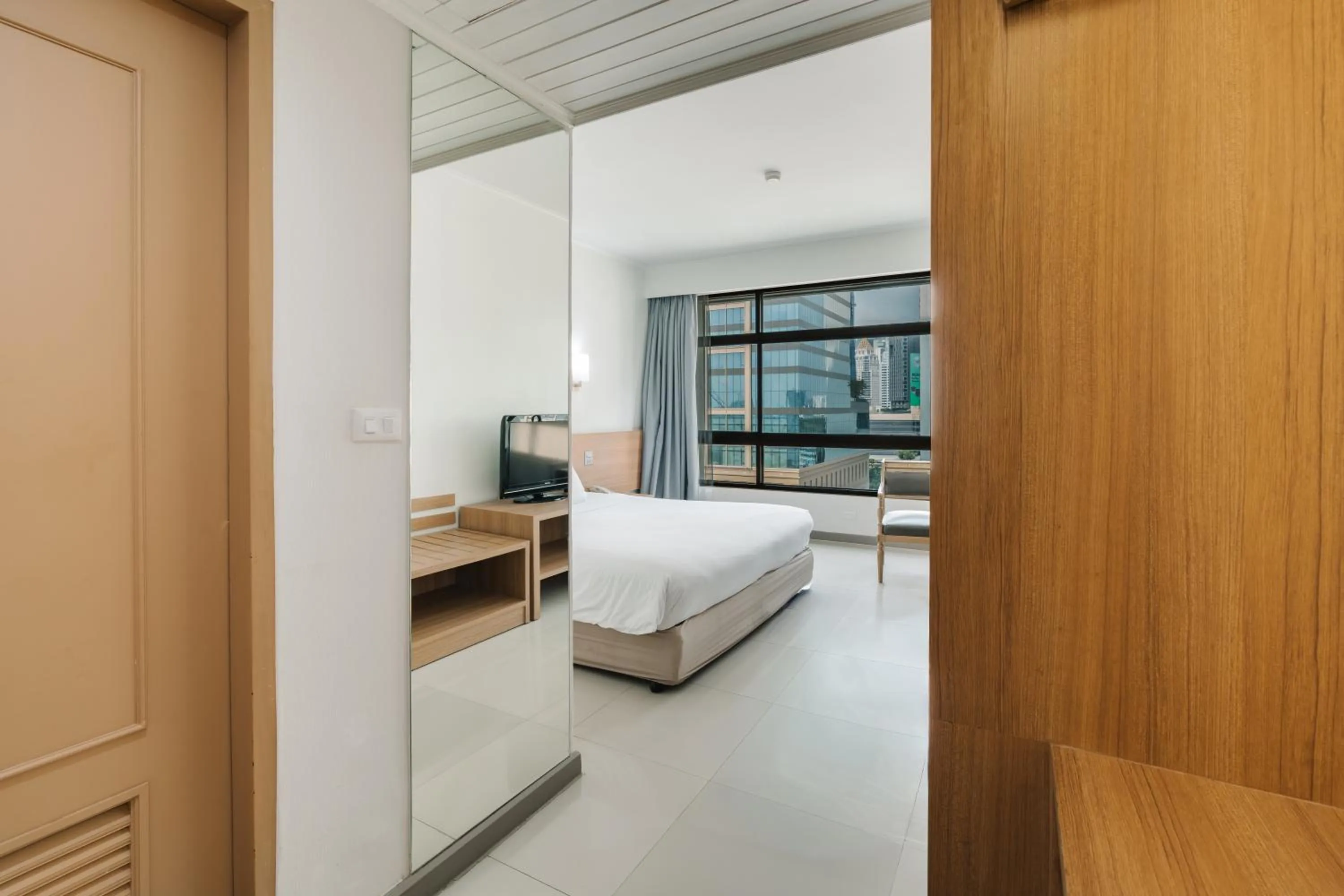 Photo of the whole room, Bed in Pinnacle Lumpini Park Hotel