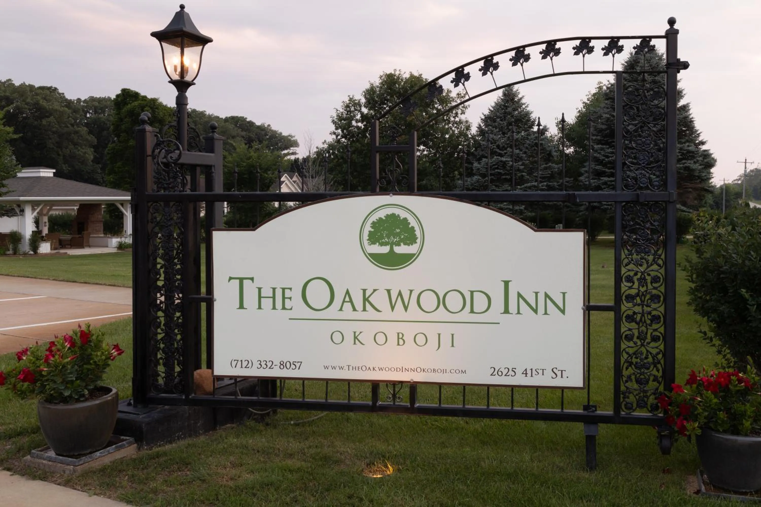 Property logo or sign in The Oakwood Inn Okoboji