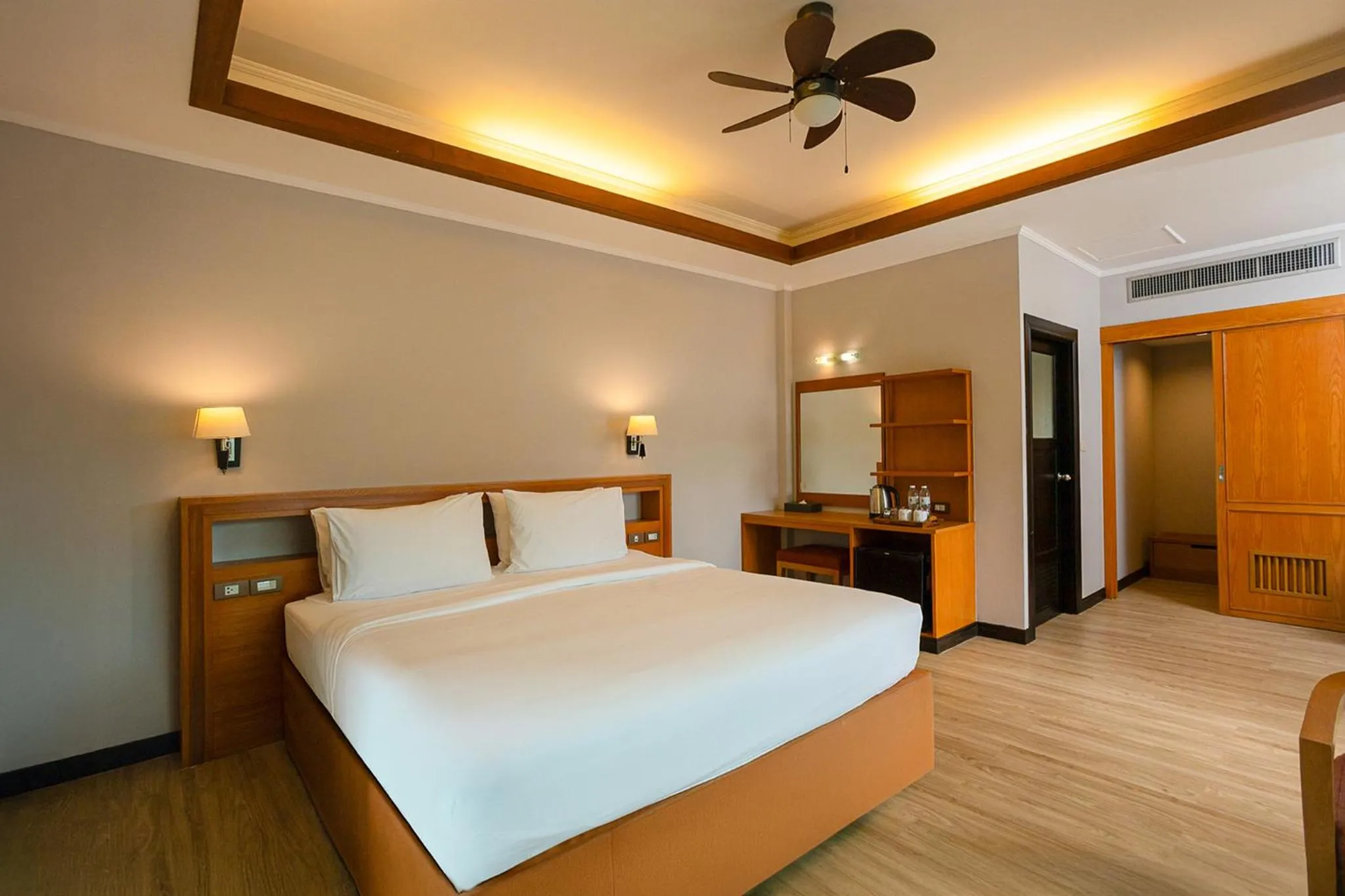 Bed in Pinnacle Grand Jomtien Resort and Beach Club