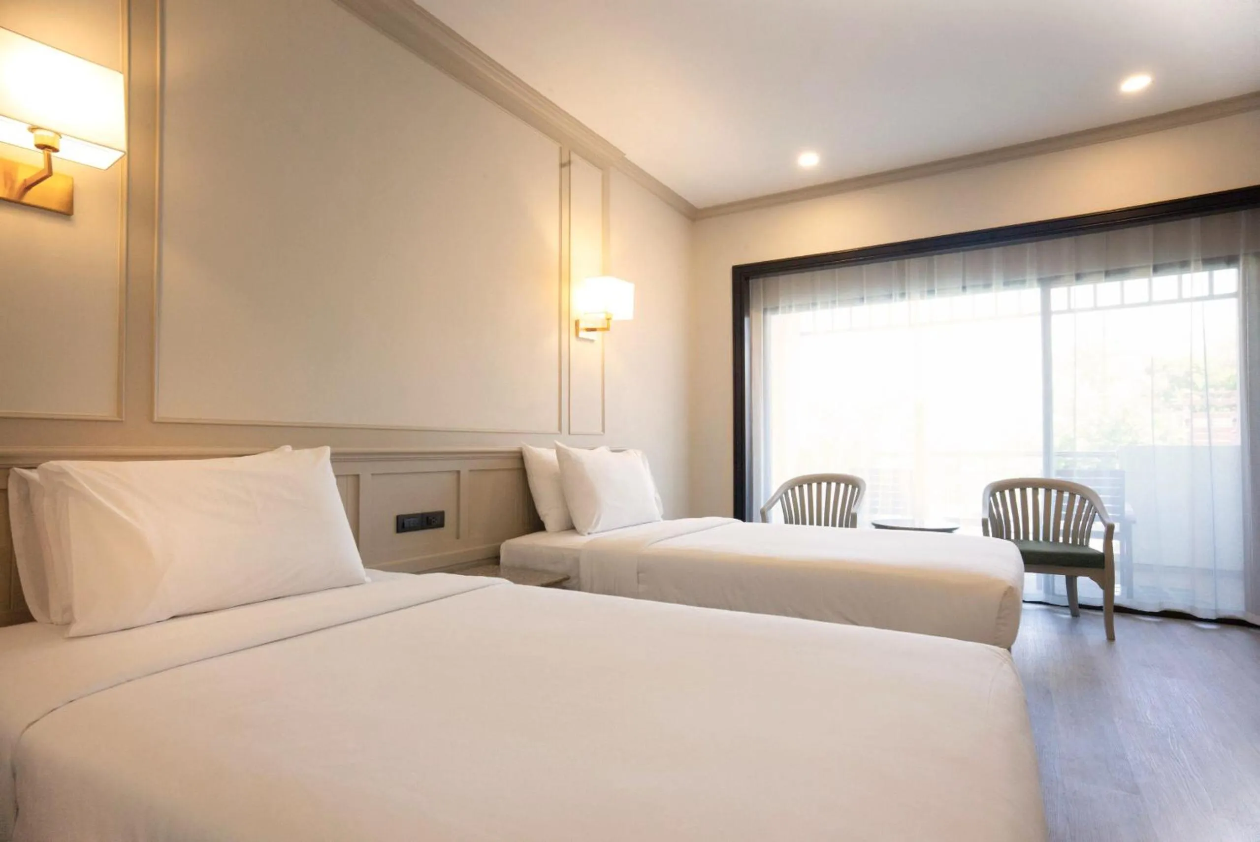 Bed in Pinnacle Grand Jomtien Resort and Beach Club
