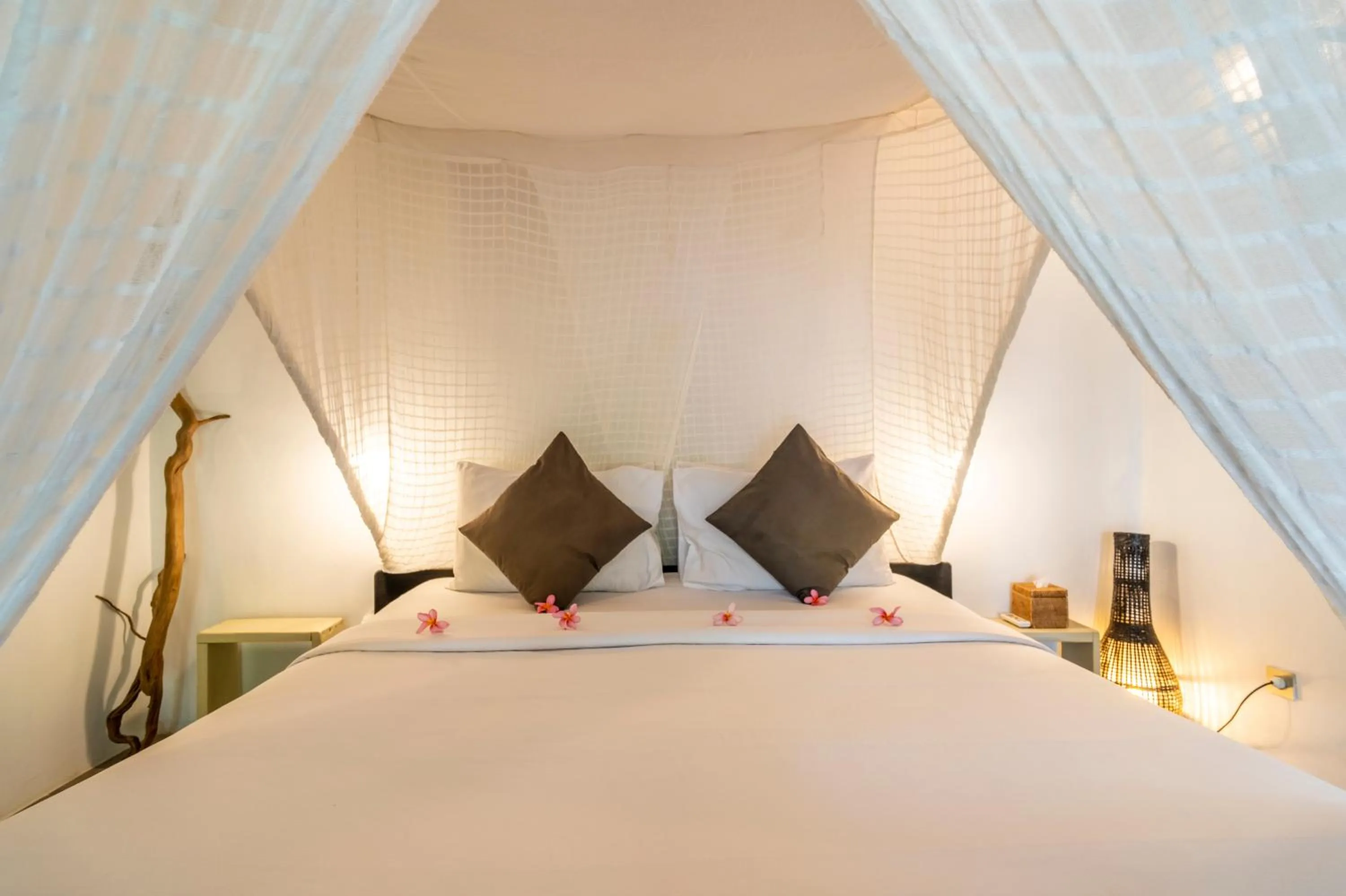 Bed in Breathe Villa Meno