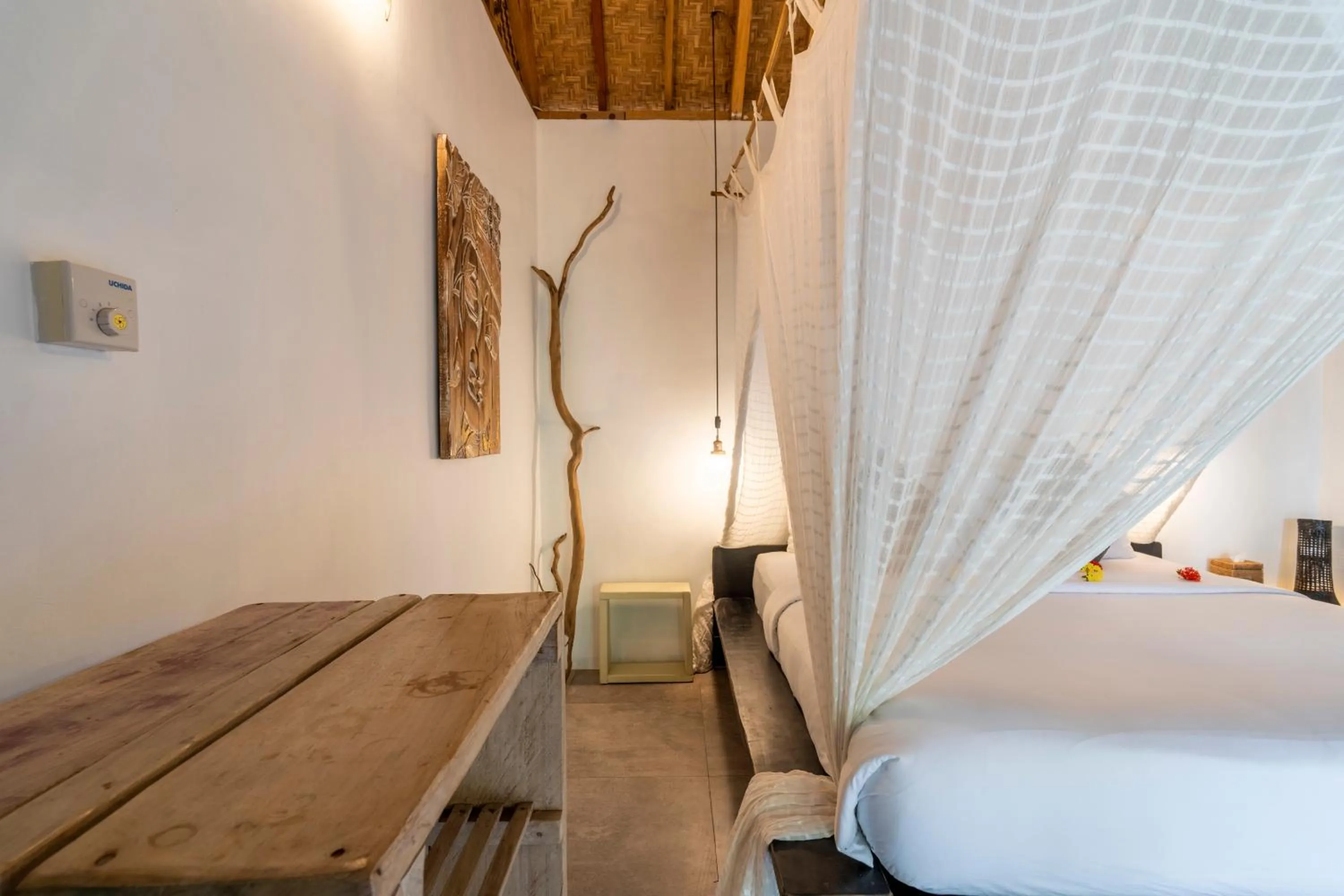 Bed in Breathe Villa Meno