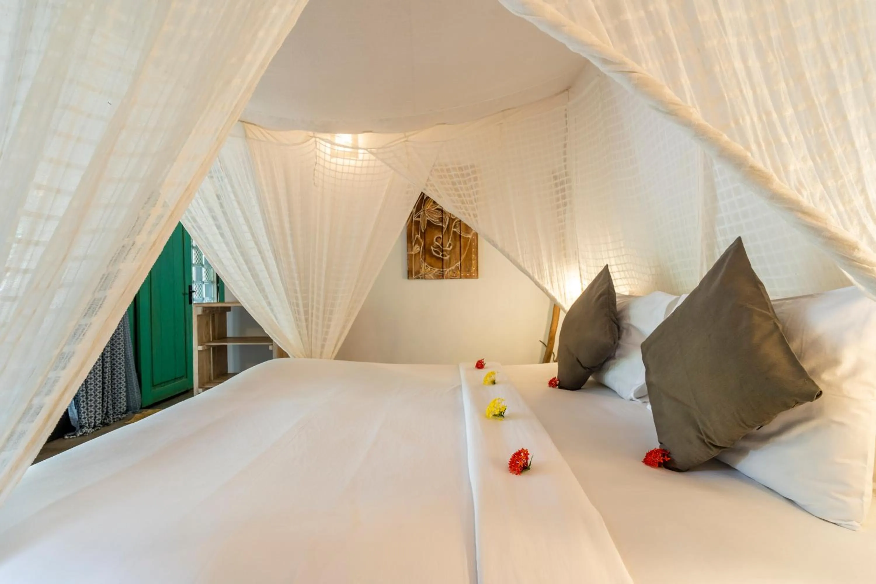 Bed in Breathe Villa Meno