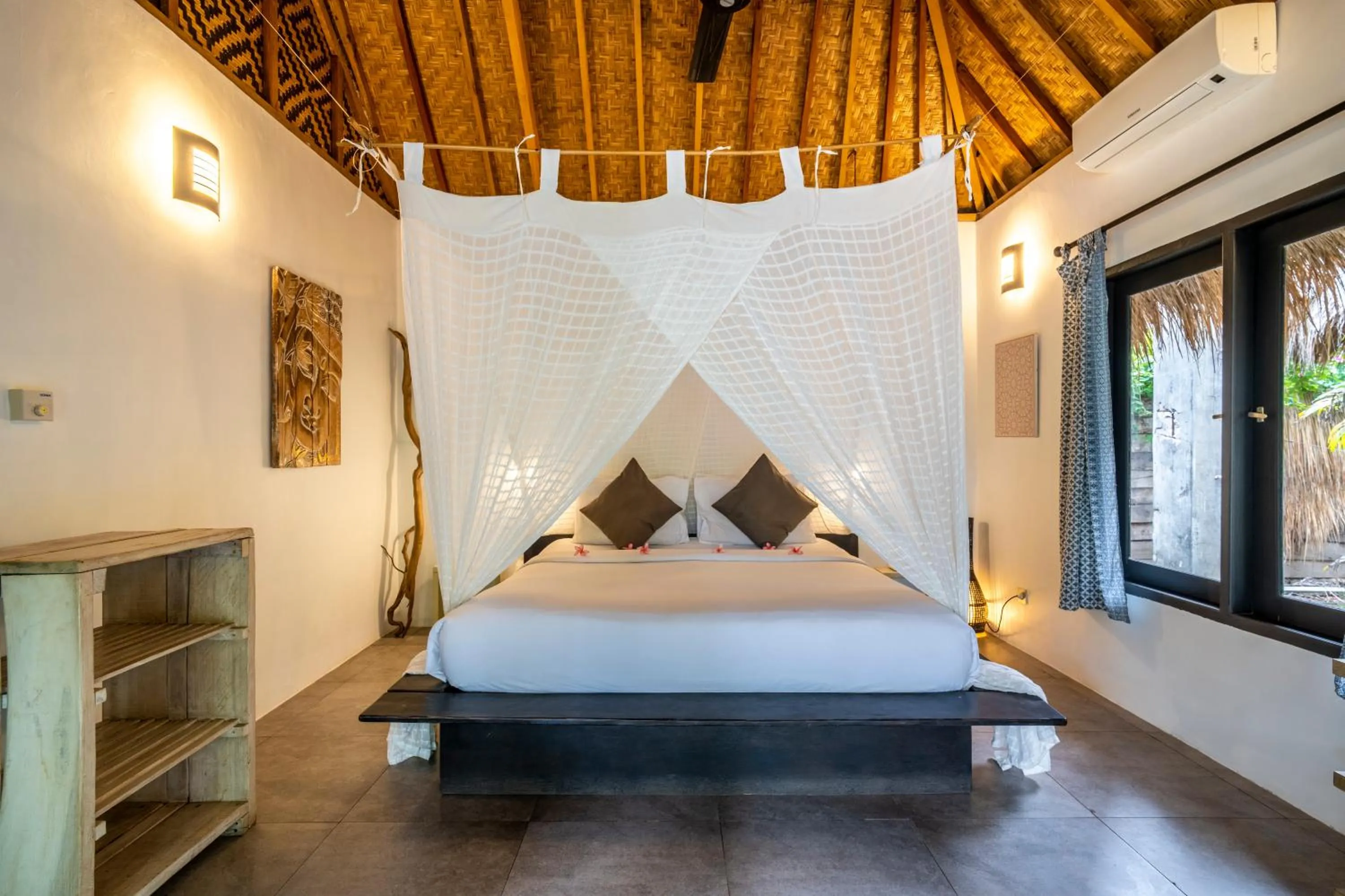 Bed in Breathe Villa Meno