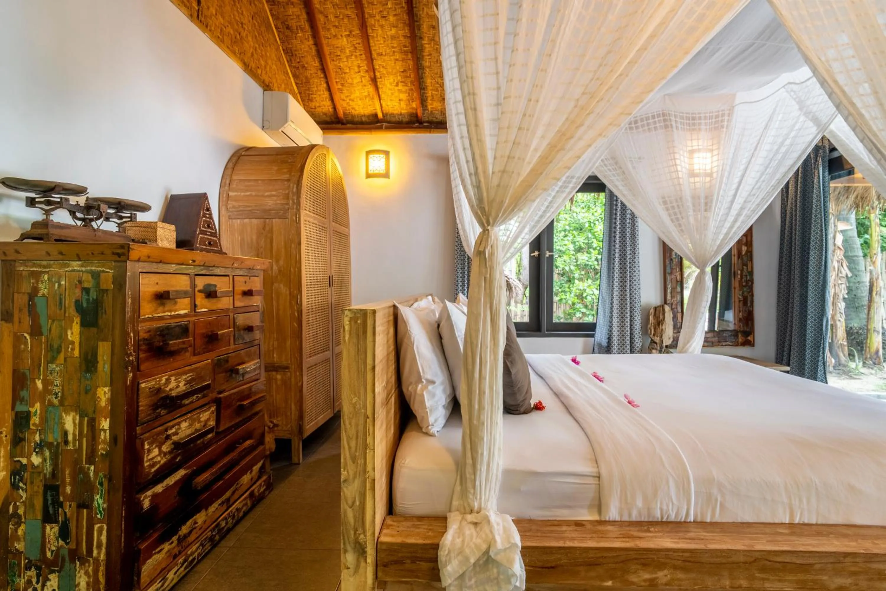 Bed in Breathe Villa Meno