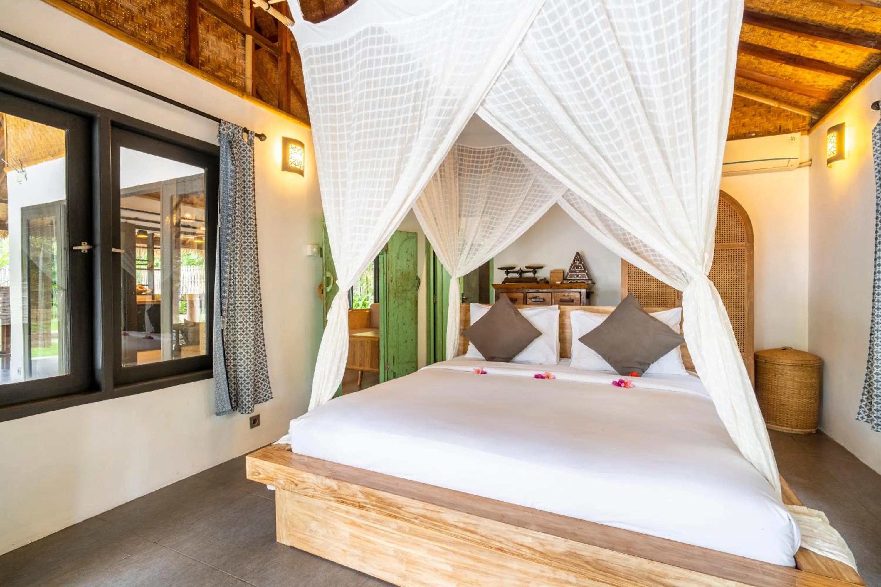 Bed in Breathe Villa Meno