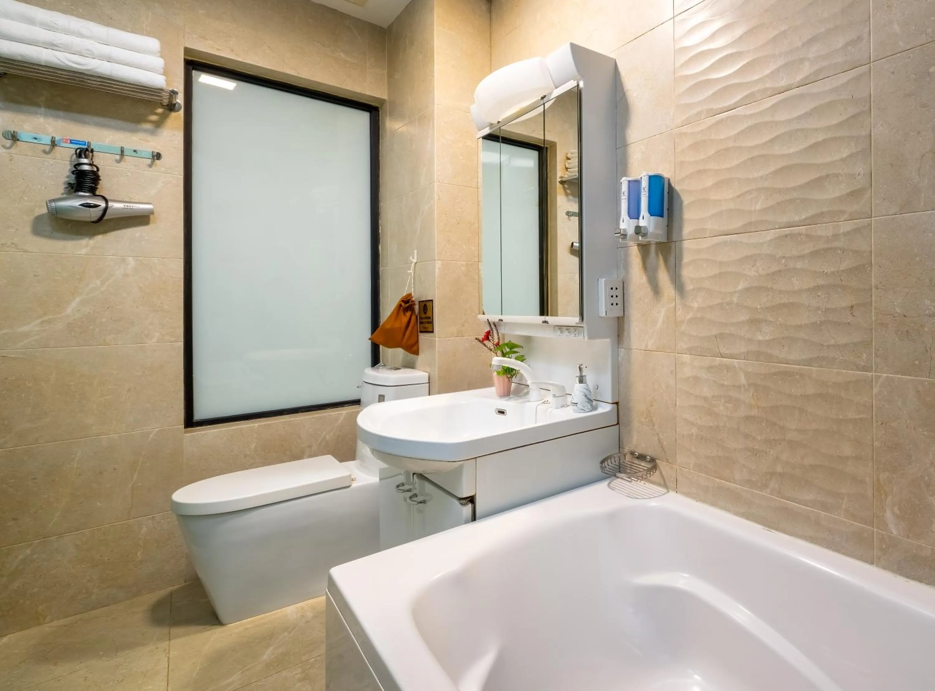 Bathroom in Bella Rosa Hotel & Travel