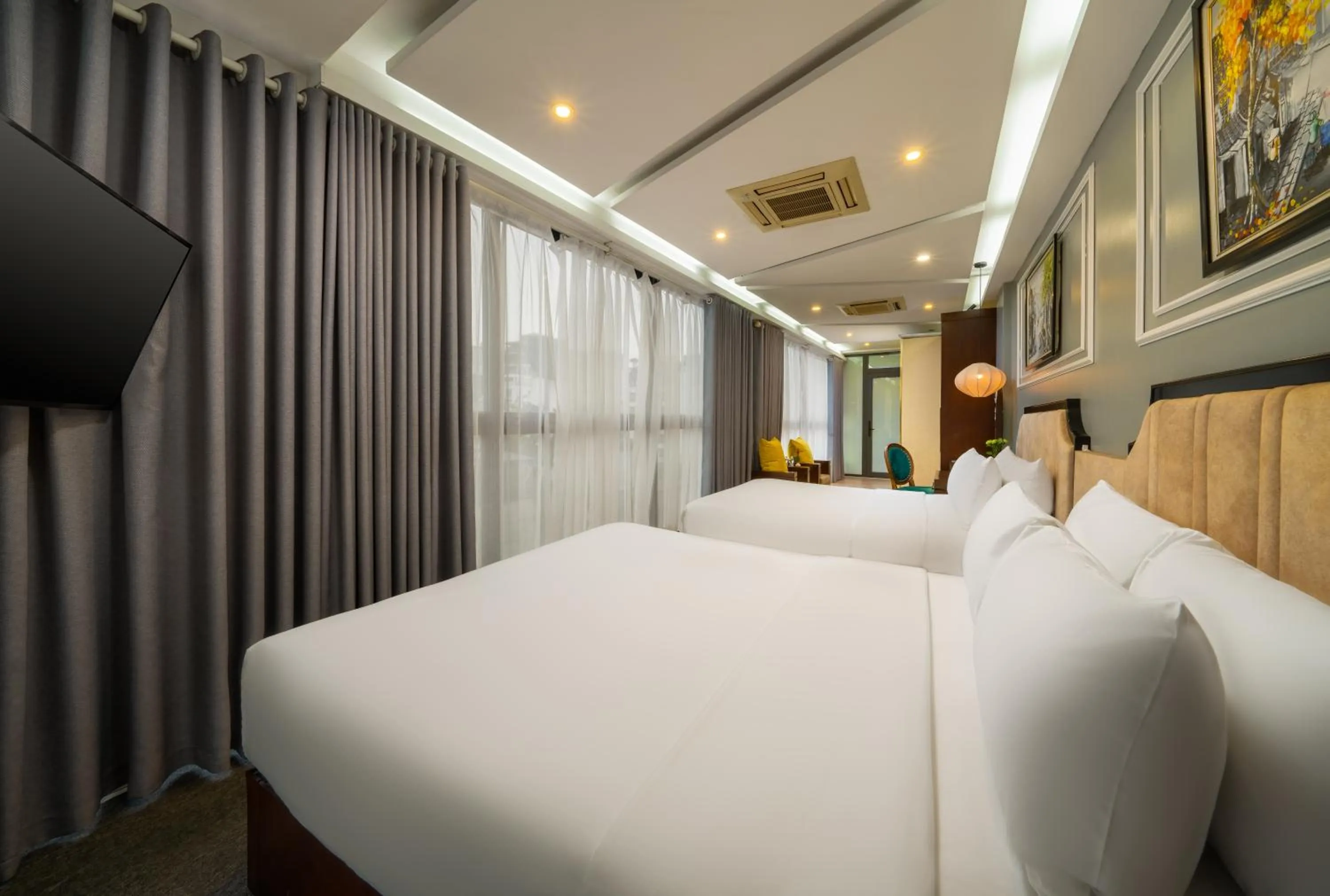 Bed in Bella Rosa Hotel & Travel