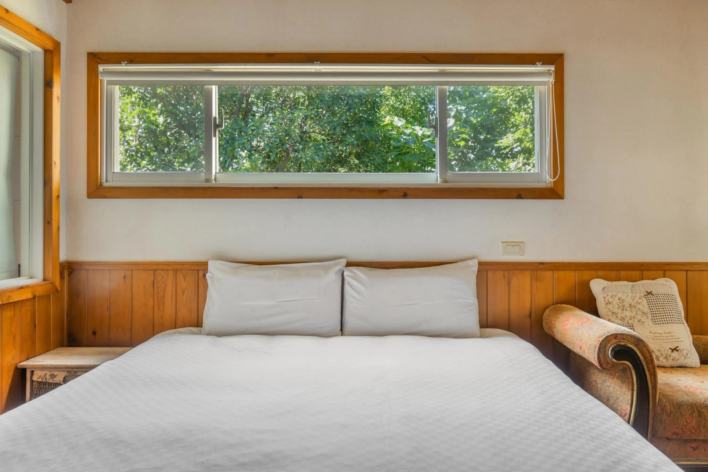 Bed in Green Forest Villa