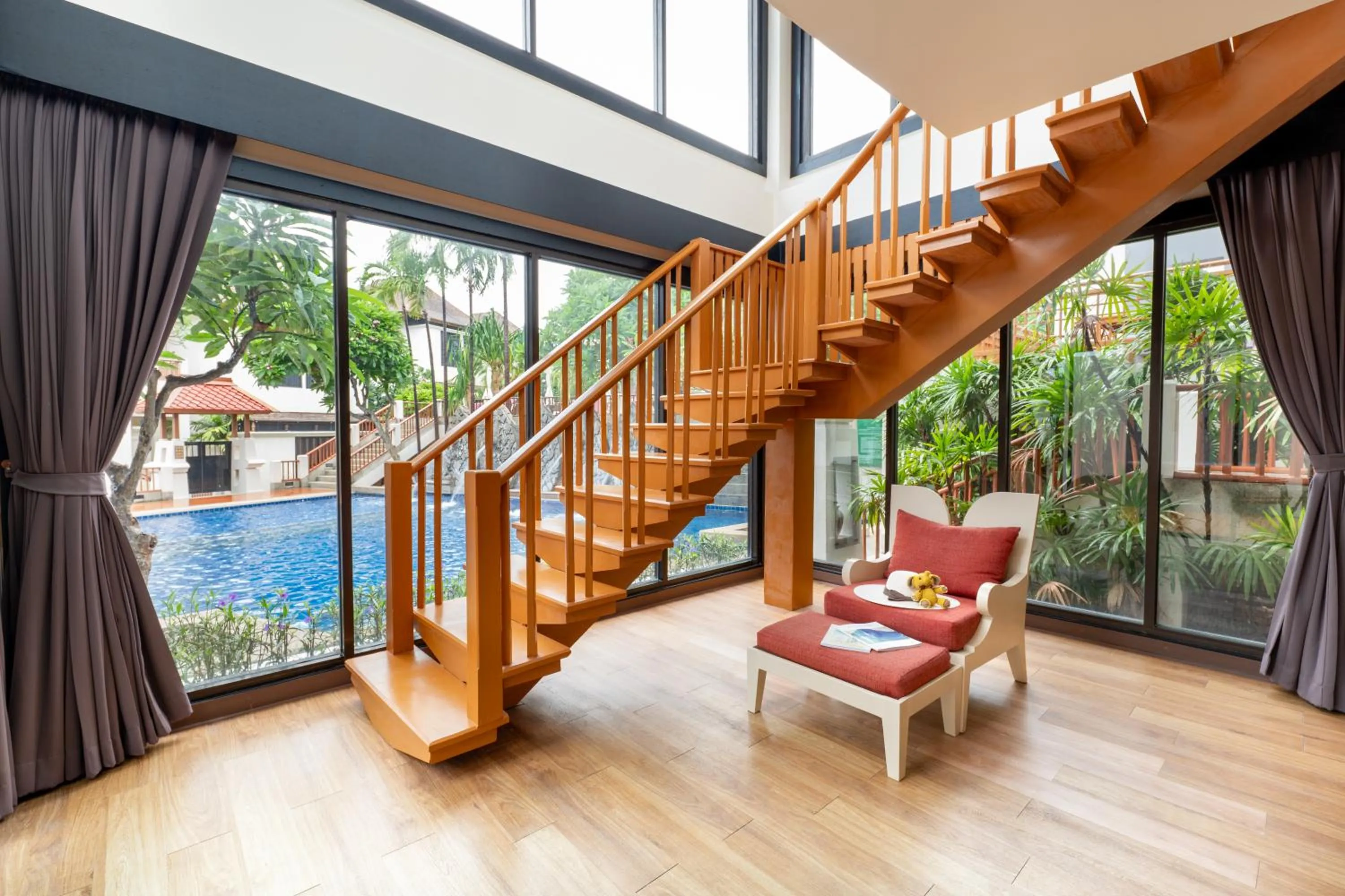 Living room in The Briza Beach Resort, Samui - SHA Plus