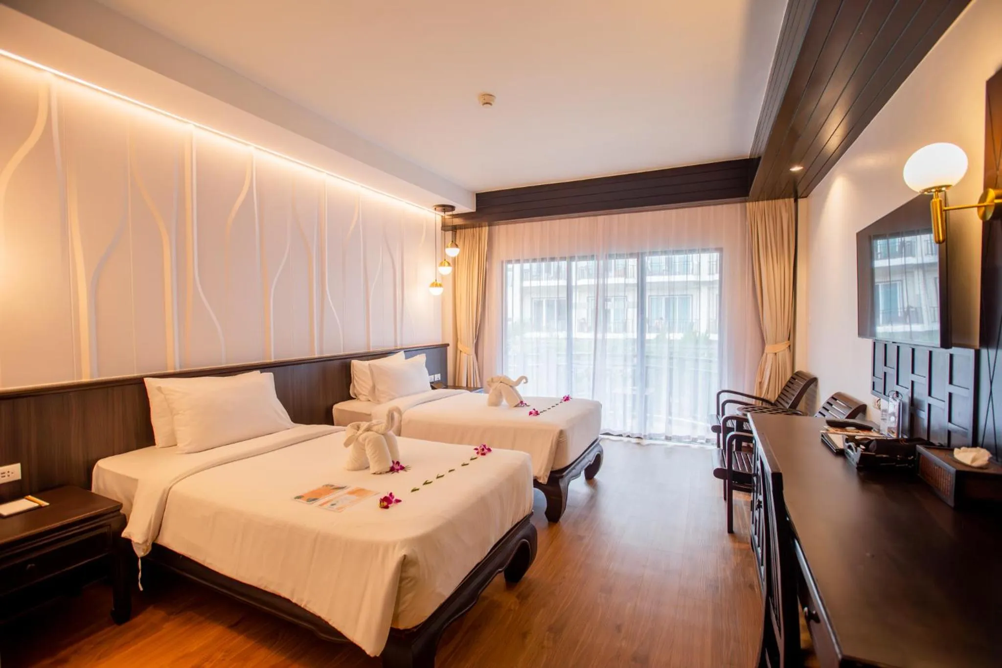 Photo of the whole room, Bed in Nipa Resort, Patong Beach