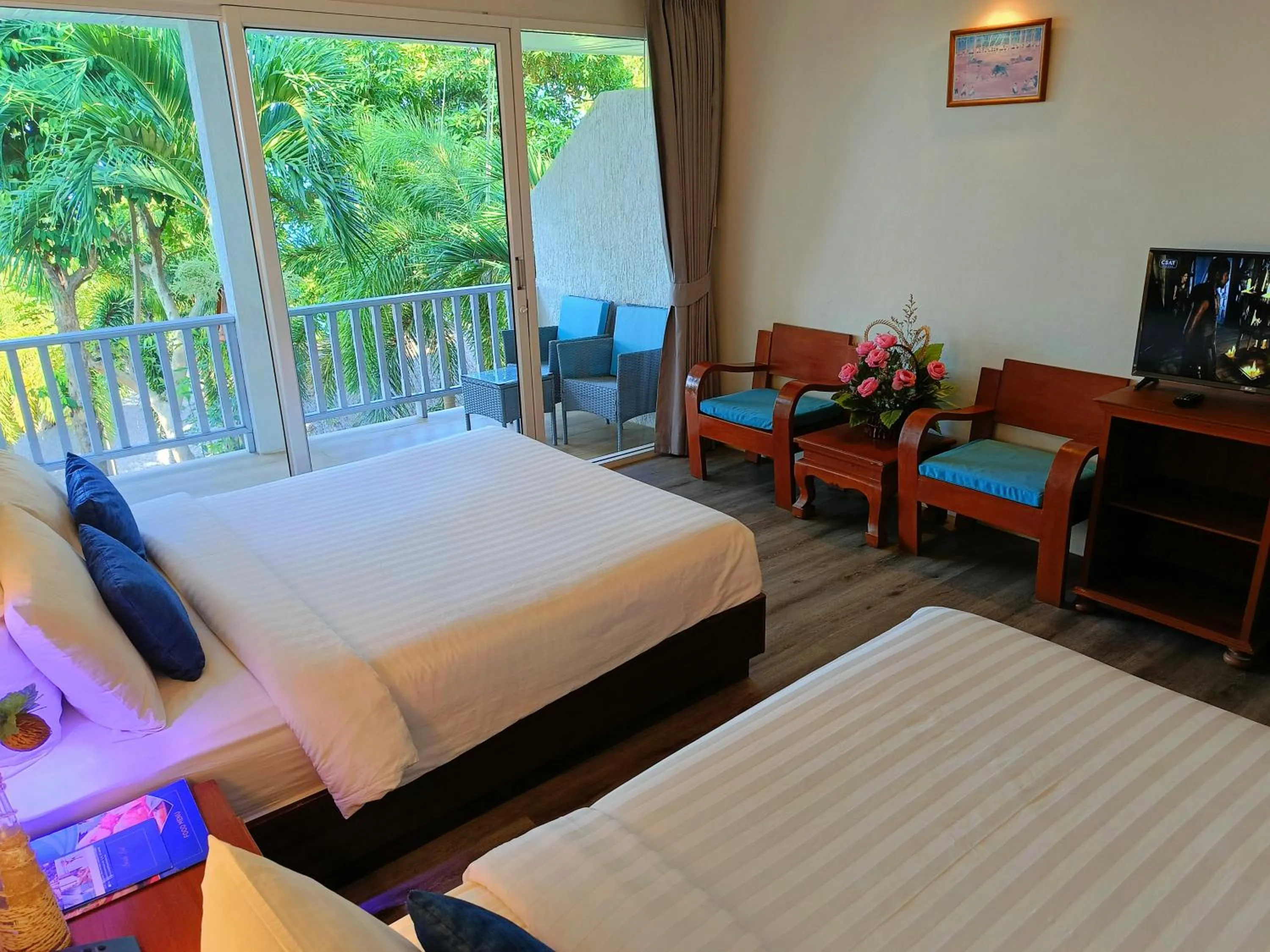 Bed in Coral Cliff Beach Resort Samui - SHA Plus
