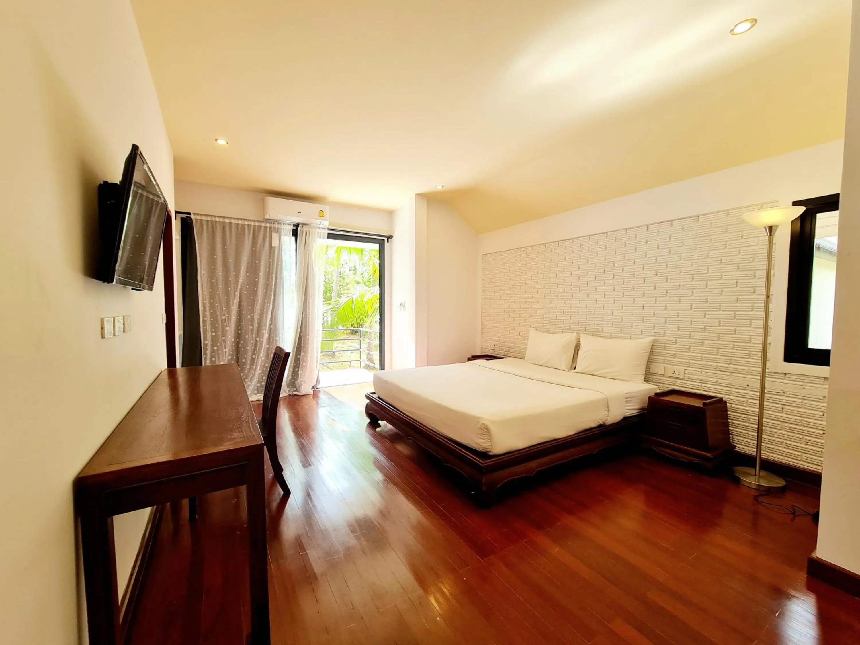 Bed in ASTROCOCO beach resort by Coconut Beach