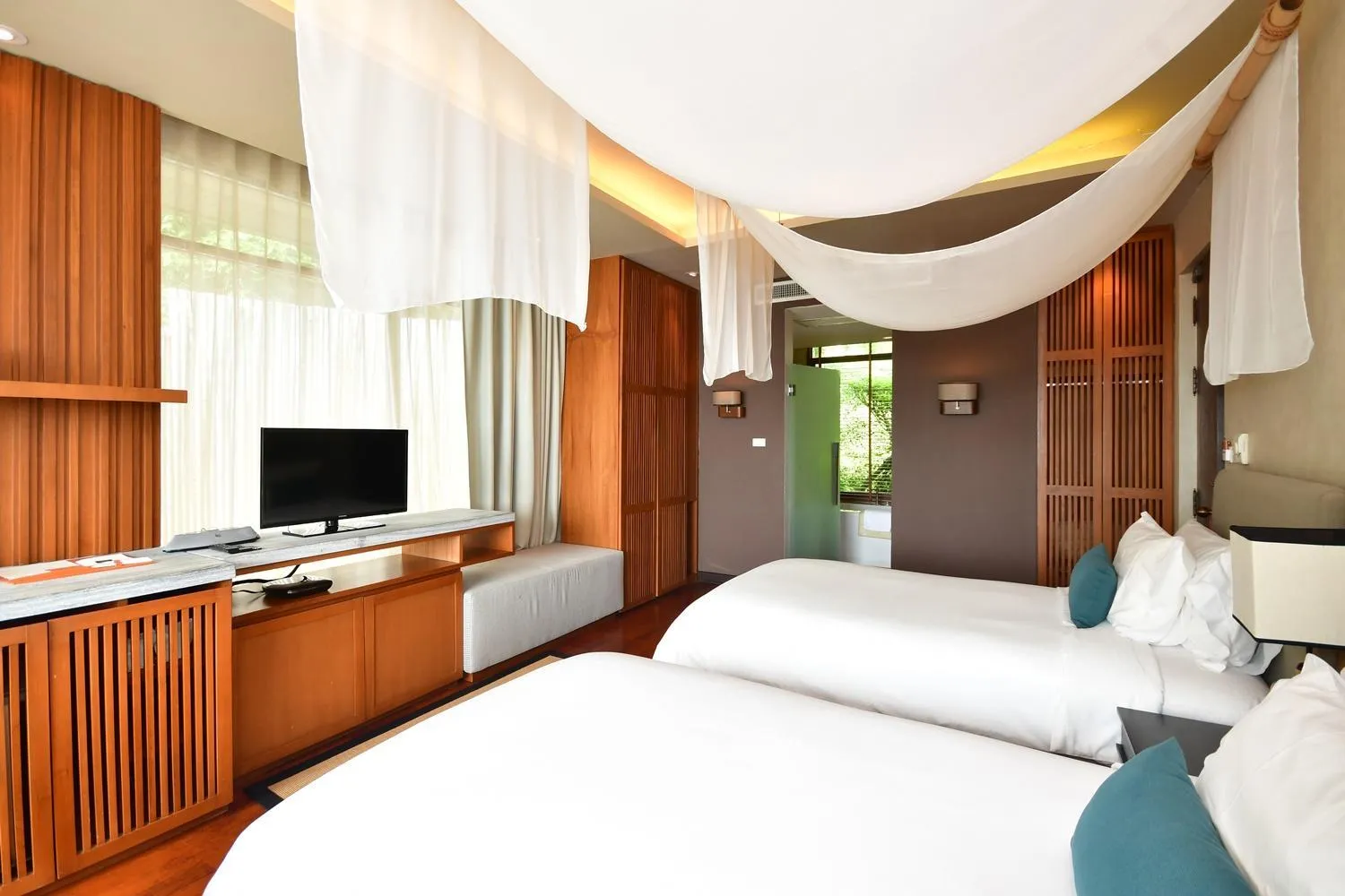 Bedroom in ShaSa Resort - Luxury Beachfront Suites