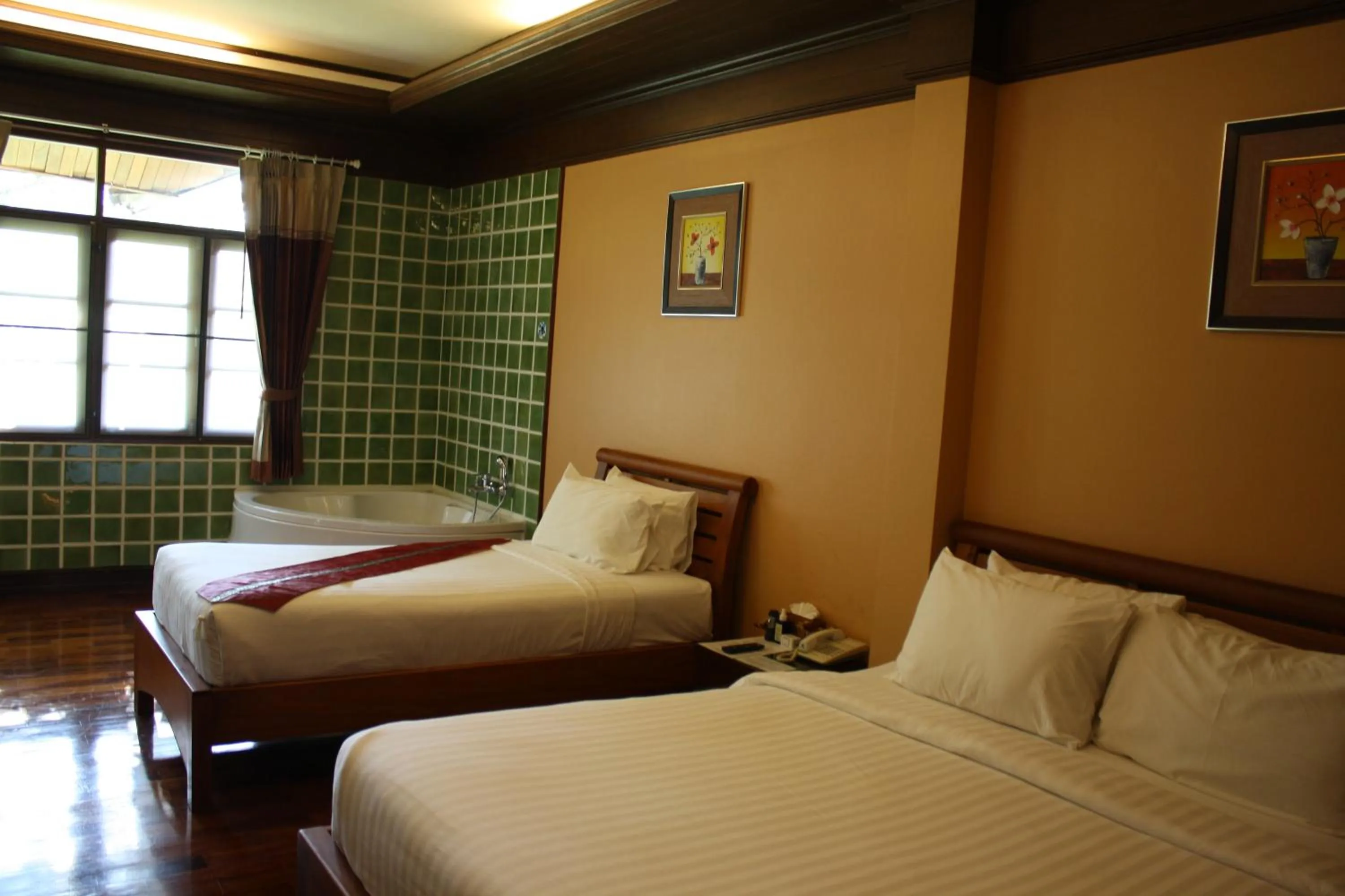 Bed in The Aiyapura Koh Chang