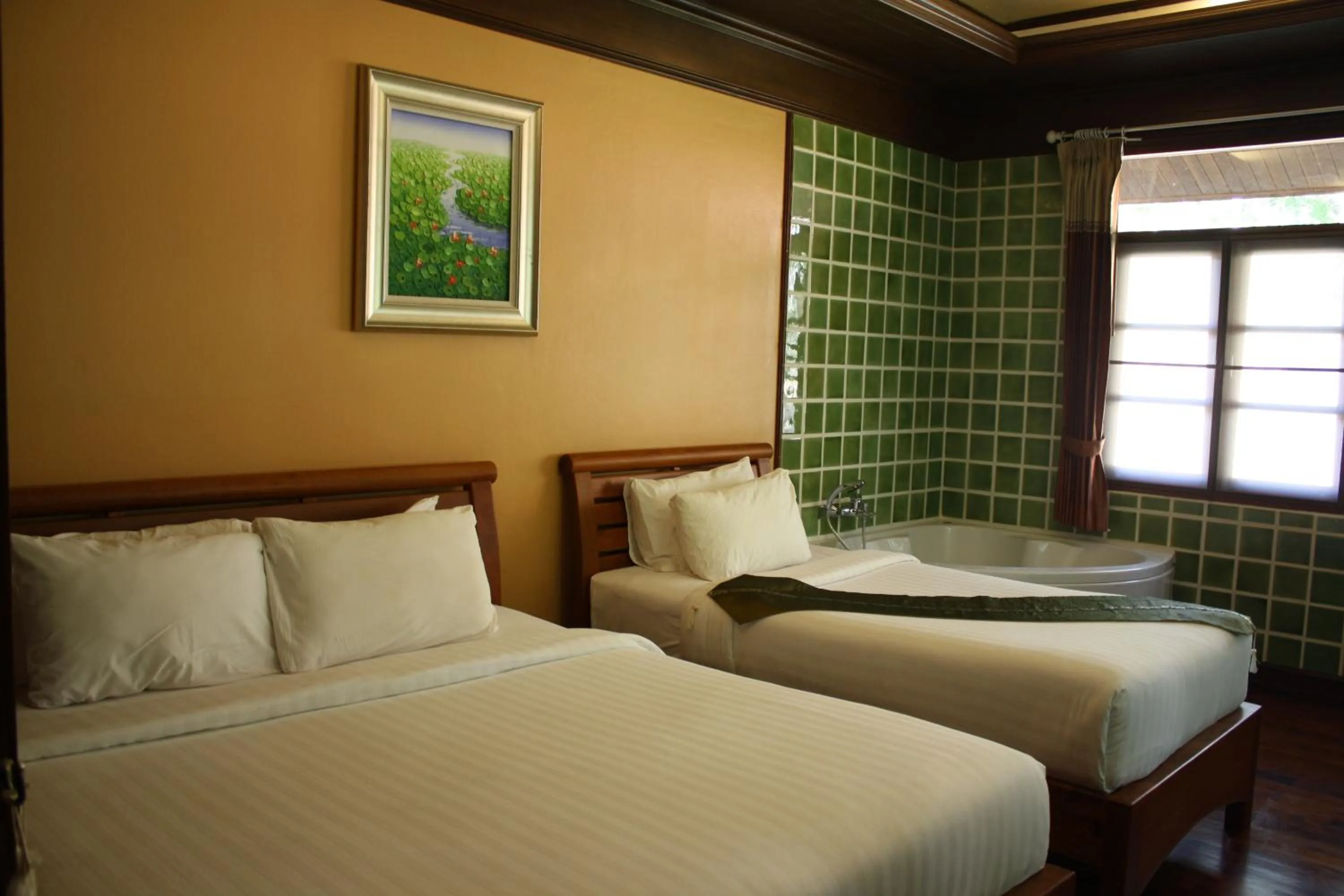 Photo of the whole room, Bed in The Aiyapura Koh Chang