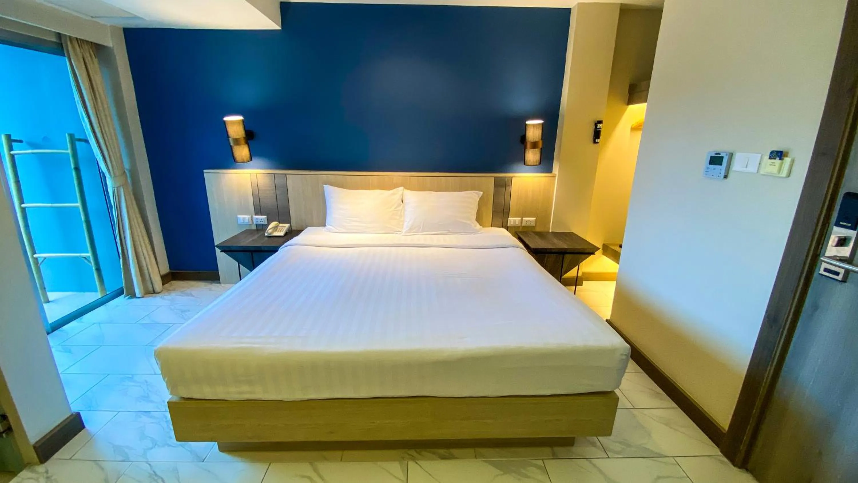 Bed in Andakira Hotel - SHA Extra Plus