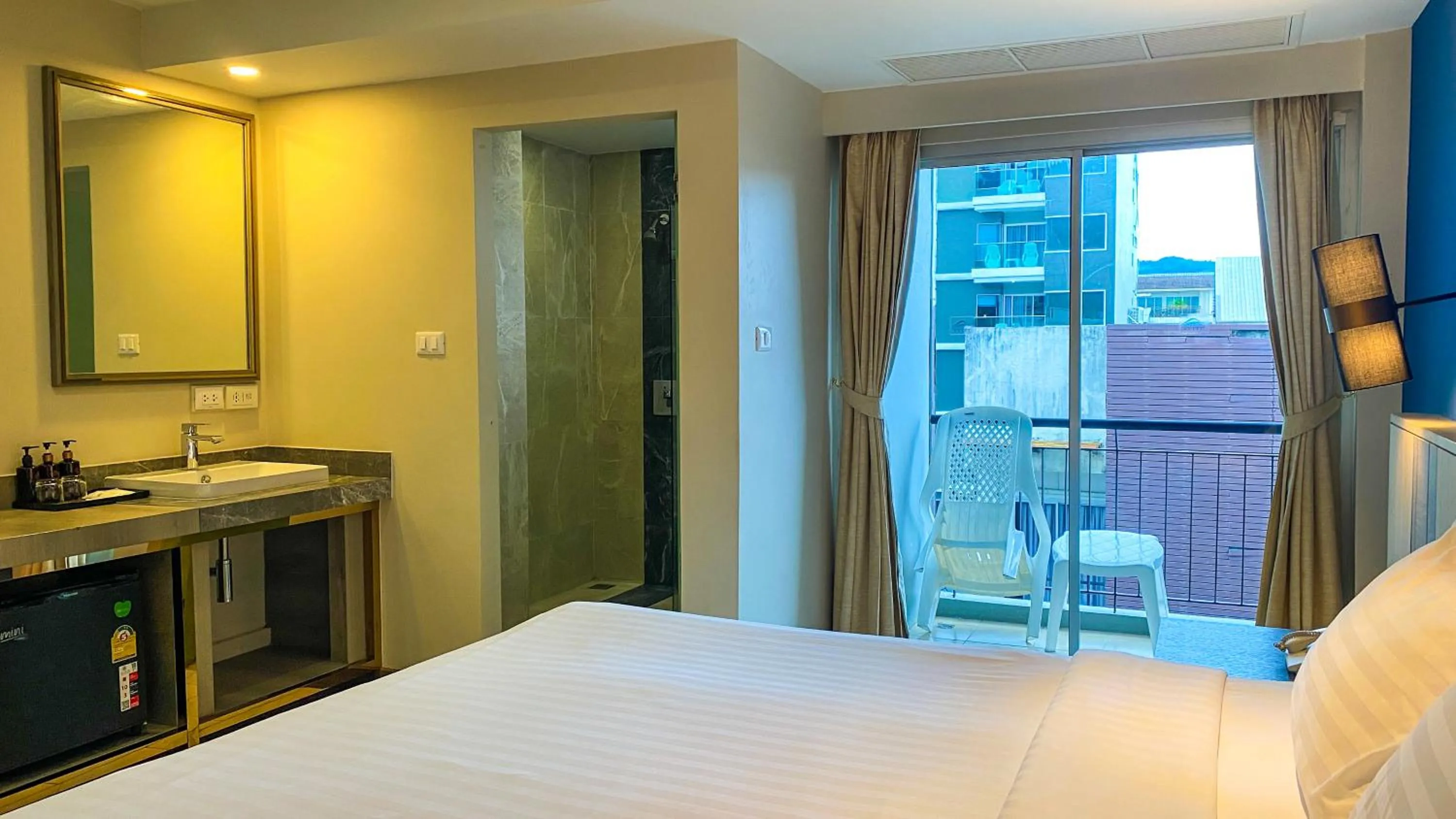 View (from property/room), Bed in Andakira Hotel - SHA Extra Plus