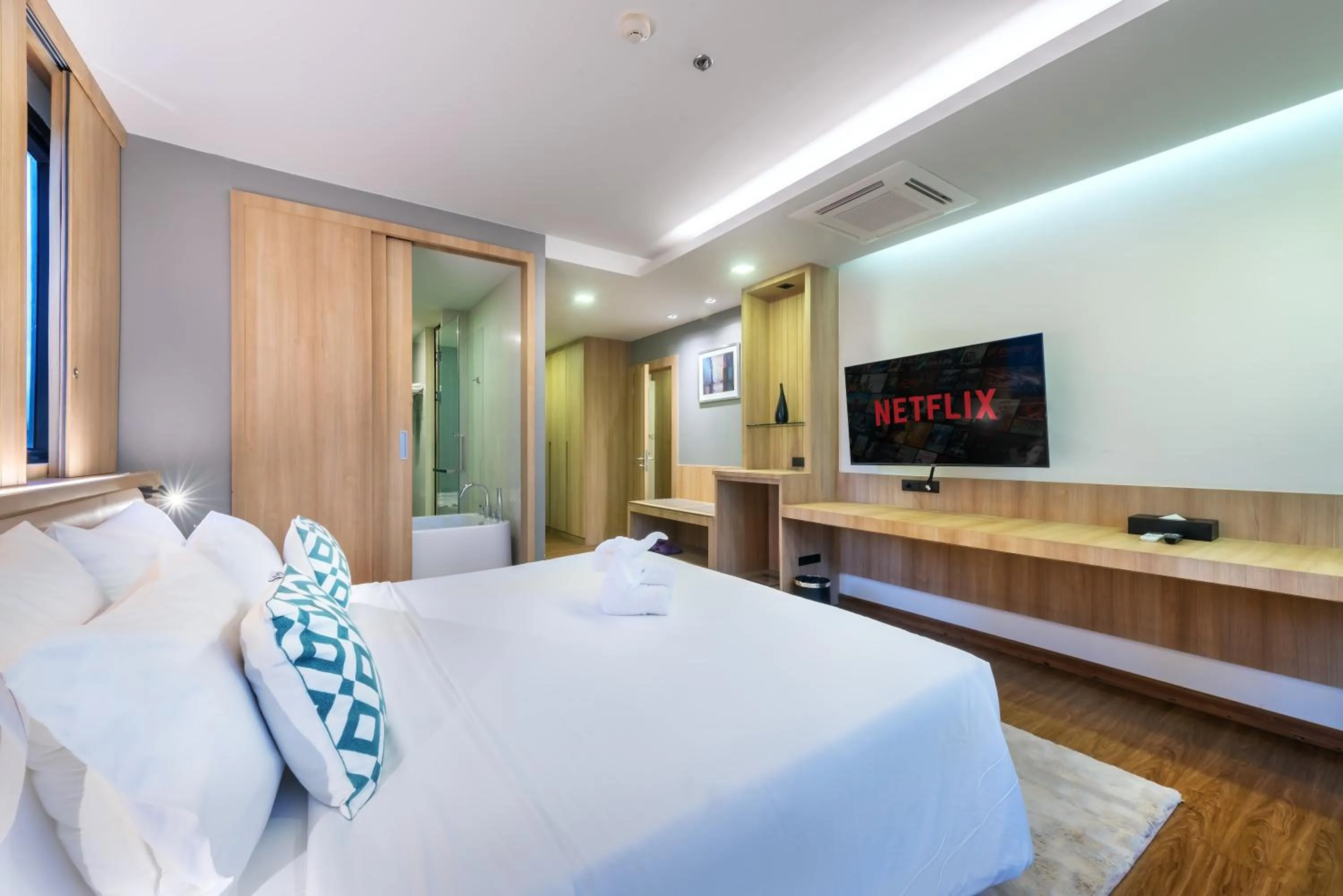 TV and multimedia, Bed in PLAAI Prime Hotel Rayong SHA Extra Plus