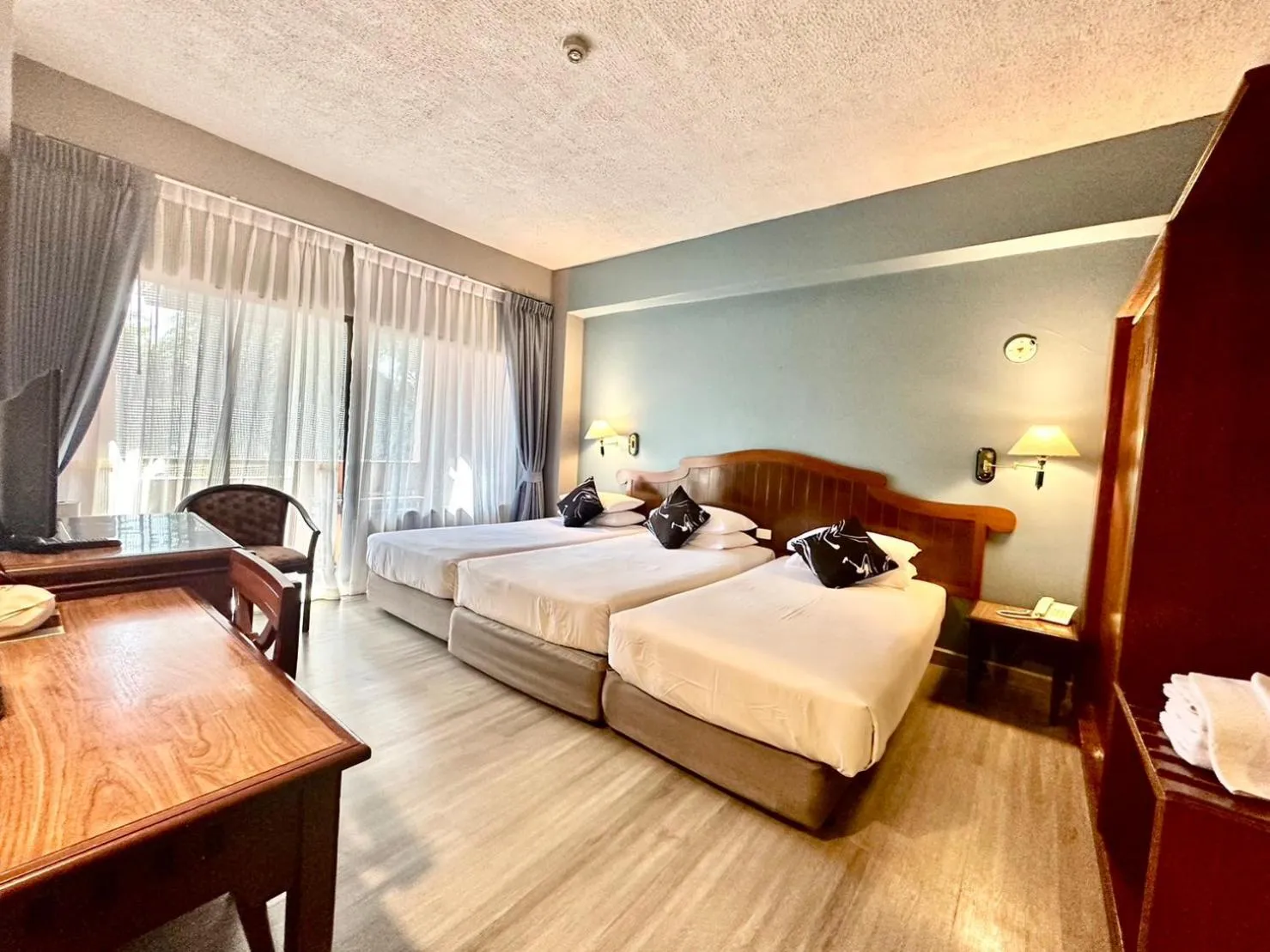 Bed in Chiangmai Gate Hotel