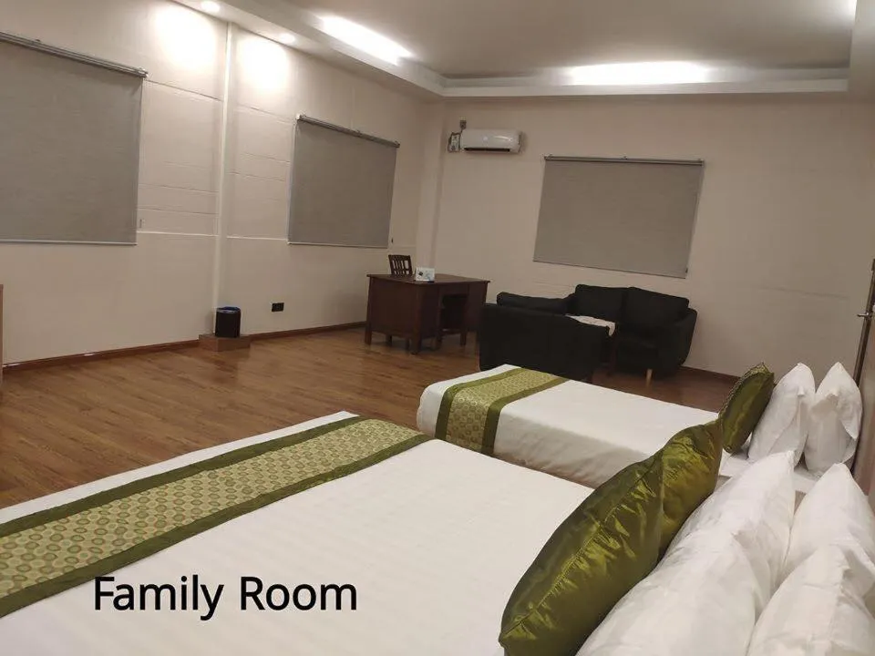 Bed in Serene Valley Hotel