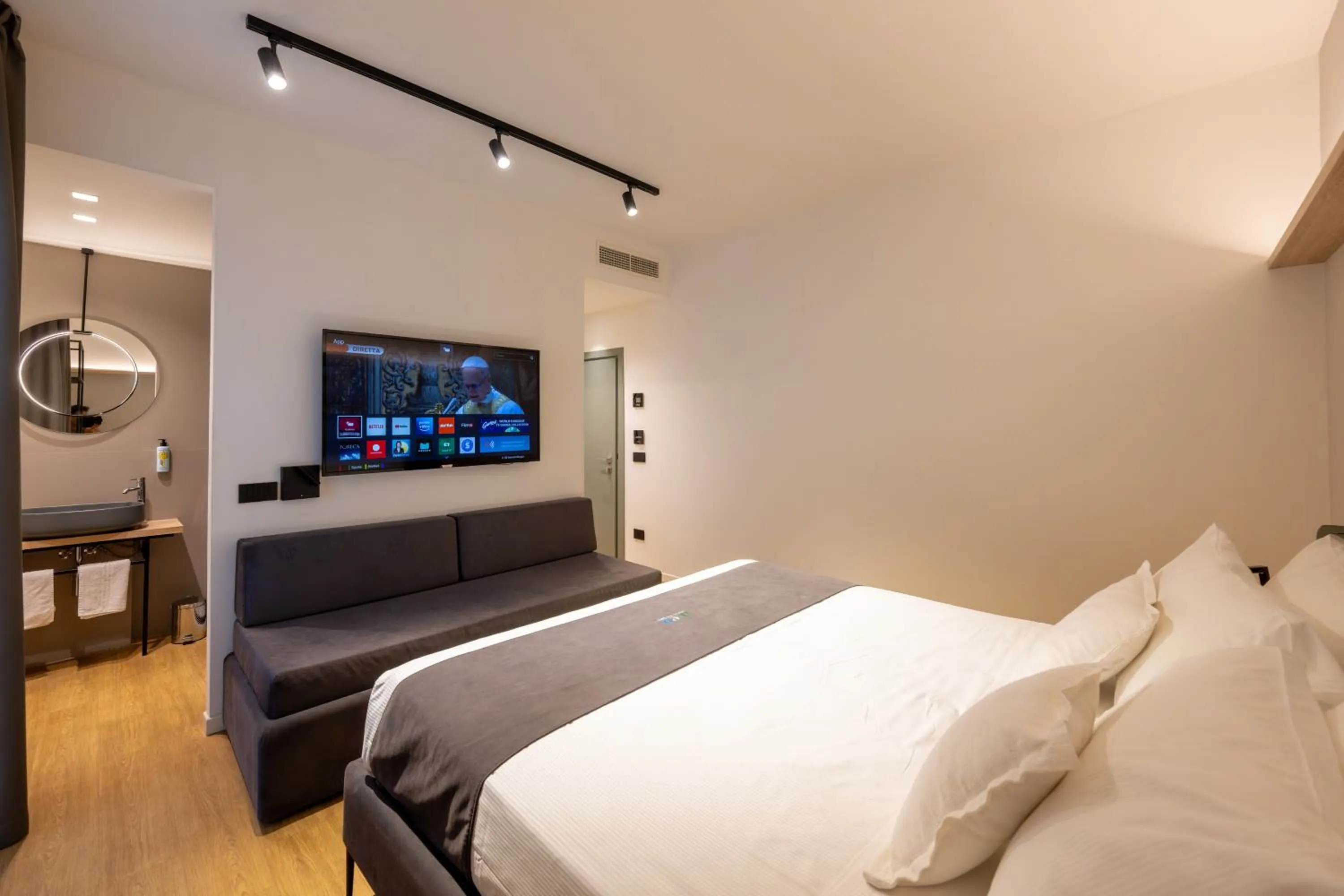 Bed in Meg Lifestyle Hotel & Apartaments
