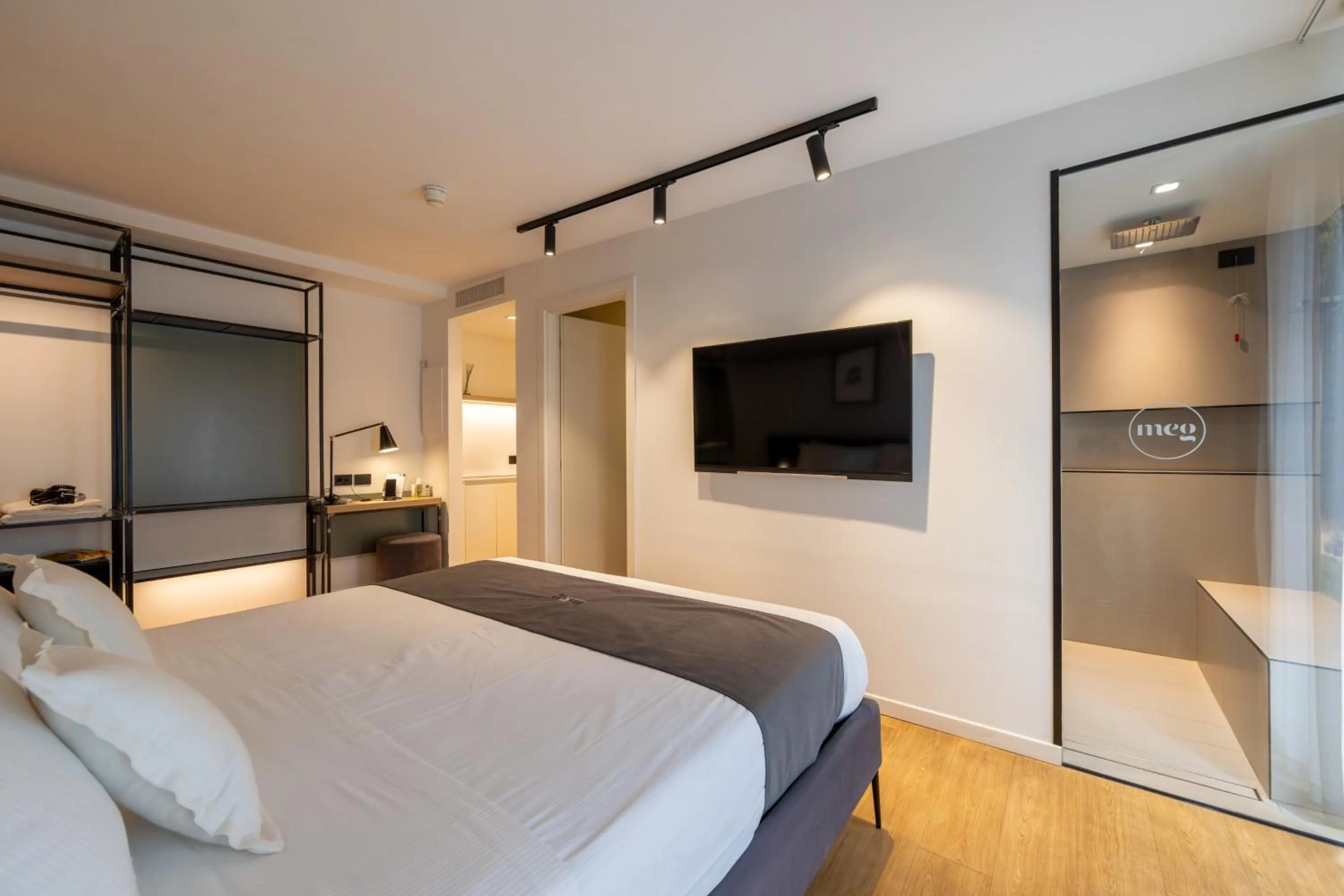 Bed in Meg Lifestyle Hotel & Apartaments