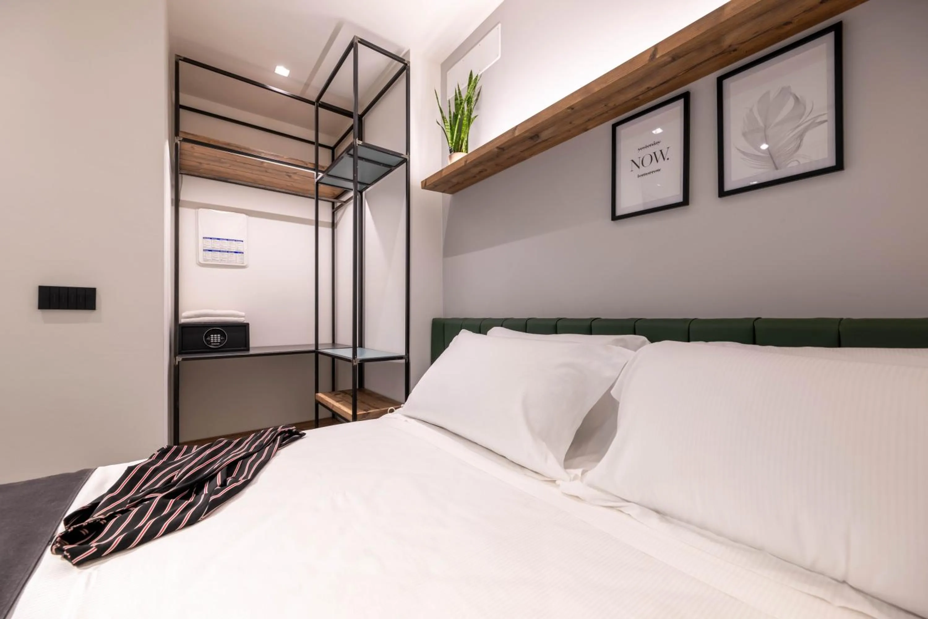 Bed in Meg Lifestyle Hotel & Apartaments