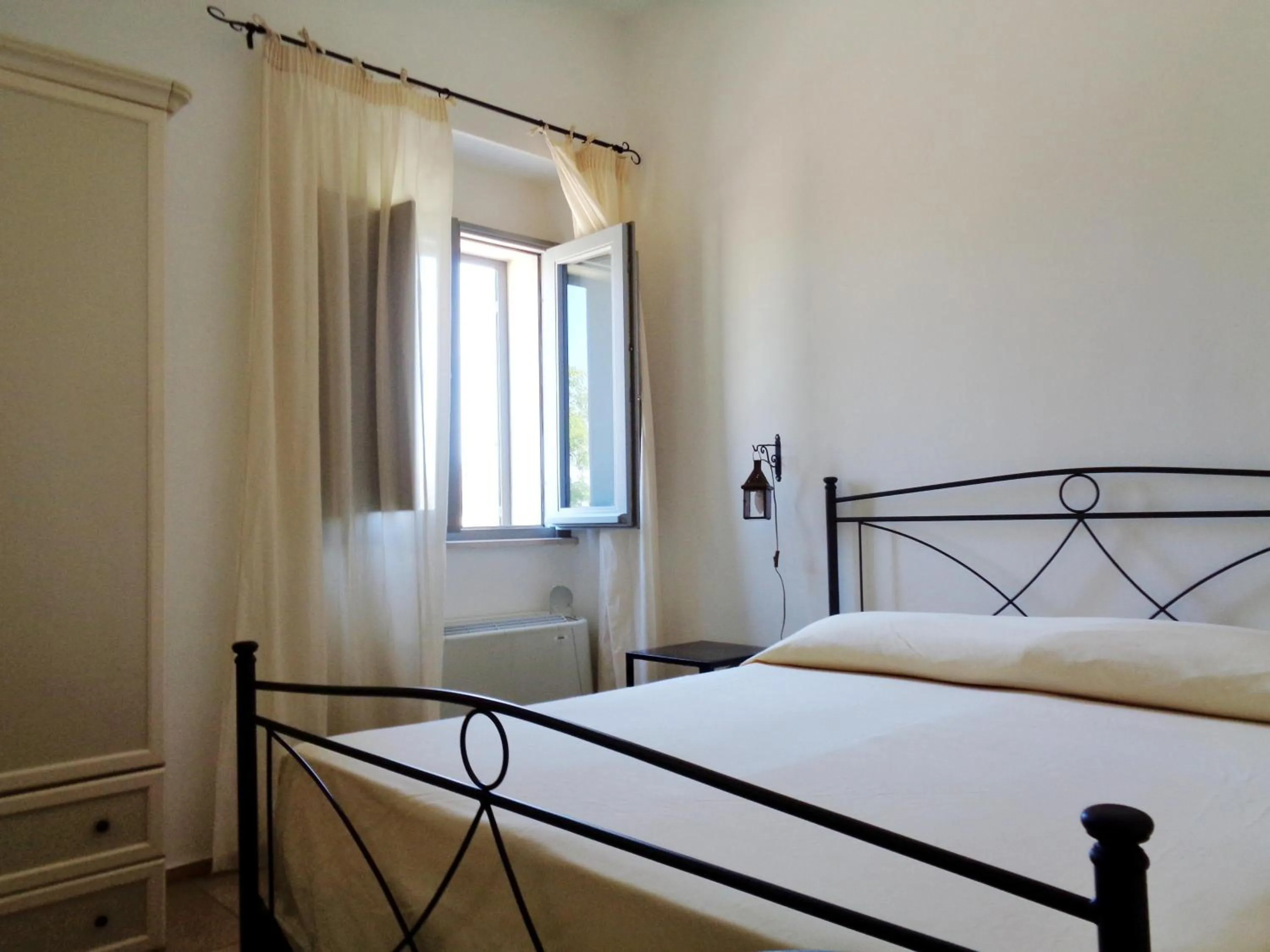Photo of the whole room, Bed in La Casa di Ora