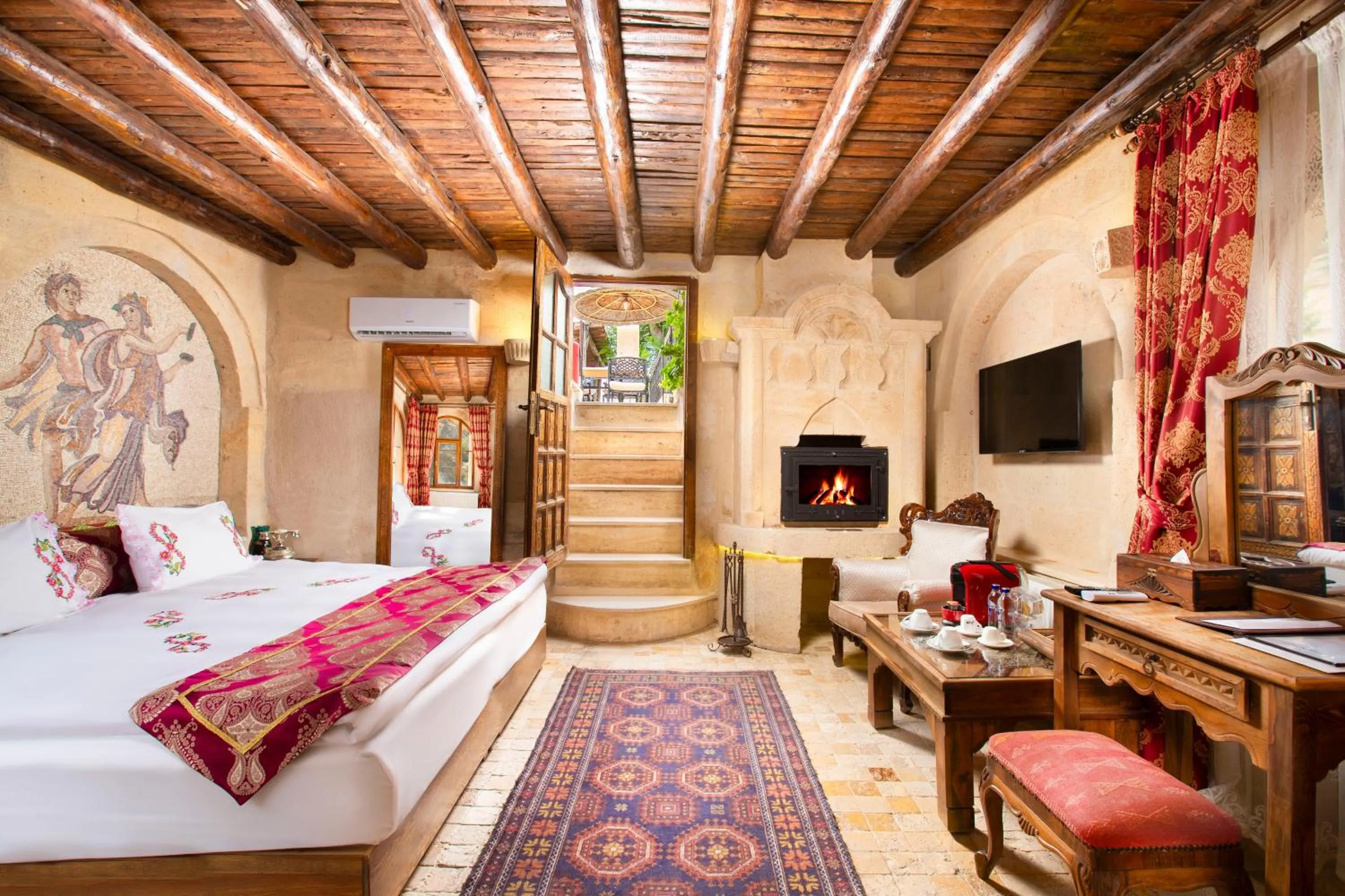 Communal lounge/ TV room, Bed in Cappadocia Gamirasu Cave Hotel