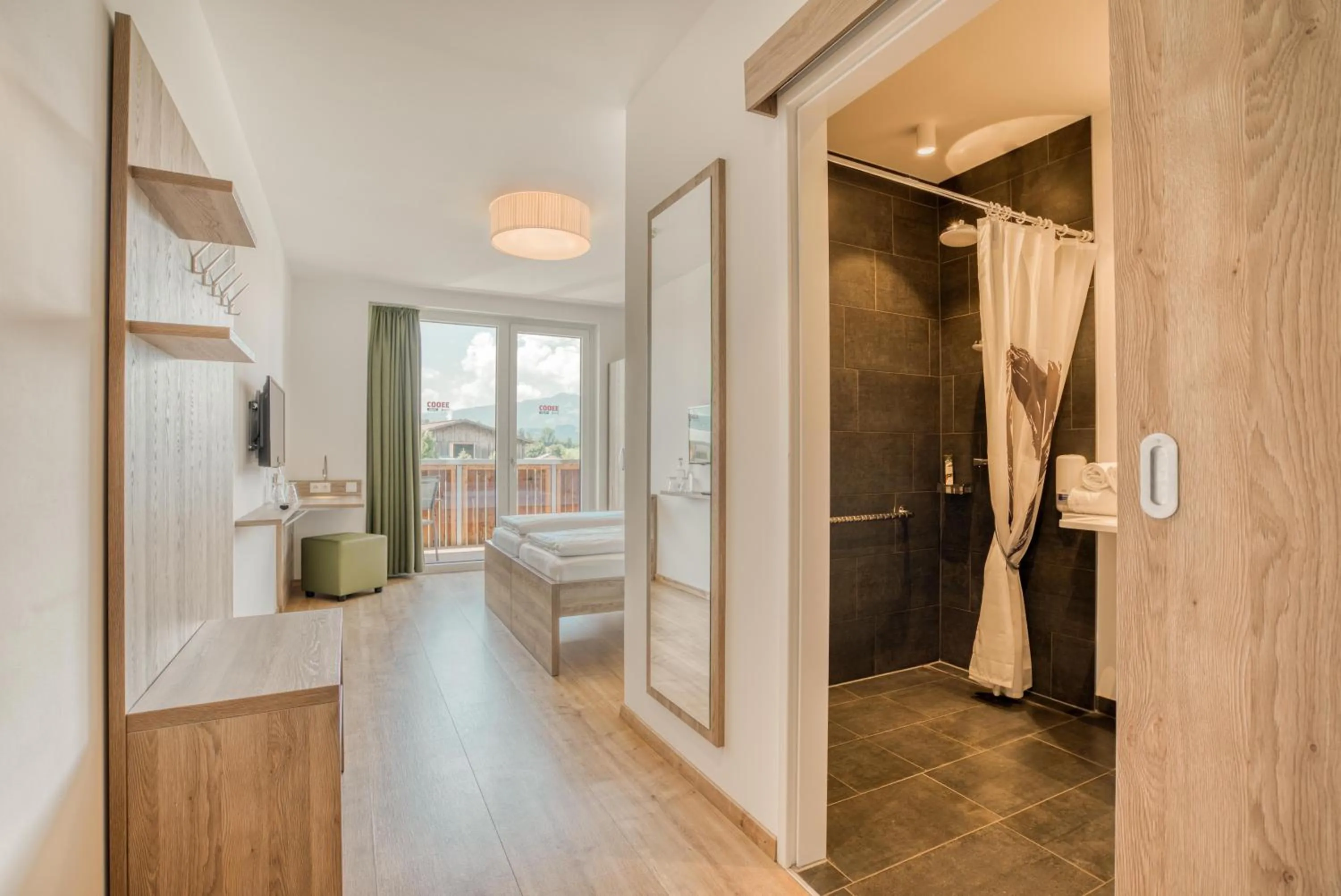 Shower in COOEE alpin Hotel Kitzbüheler Alpen