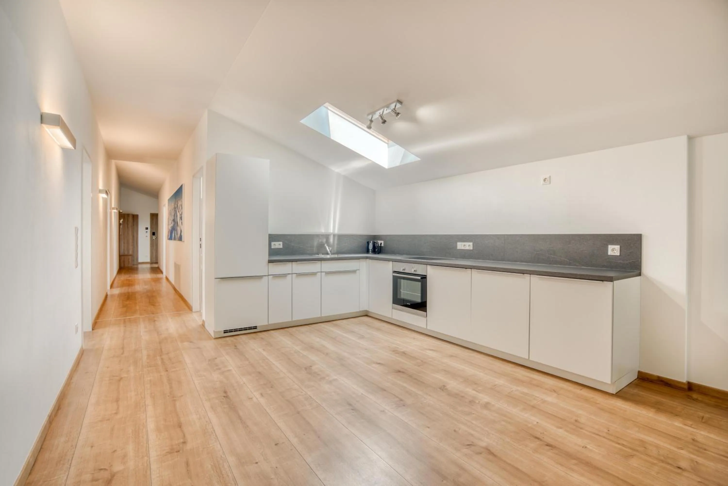 Kitchen or kitchenette in COOEE alpin Hotel Kitzbüheler Alpen