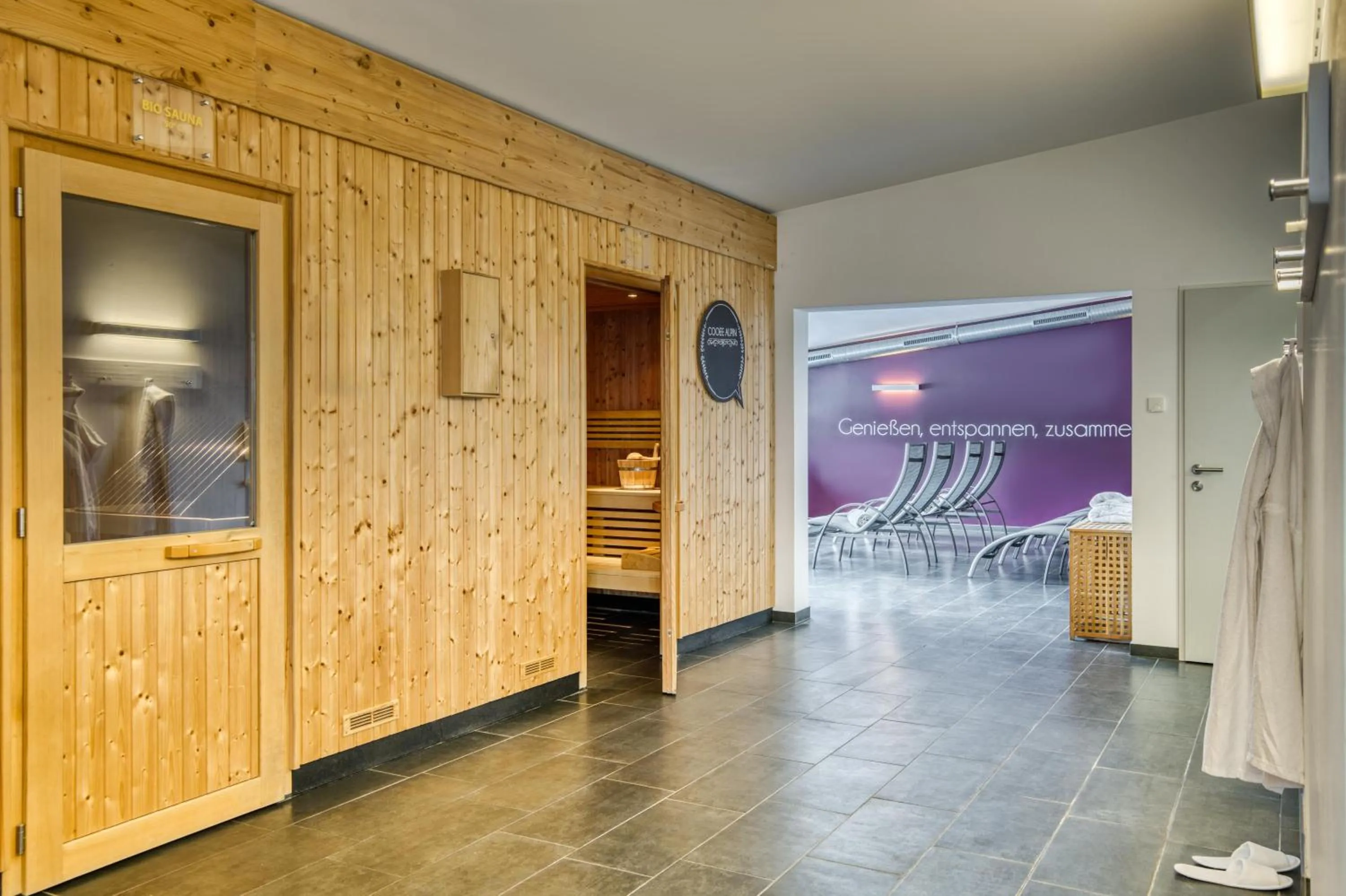 Sauna, Bed in COOEE alpin Hotel Kitzbüheler Alpen