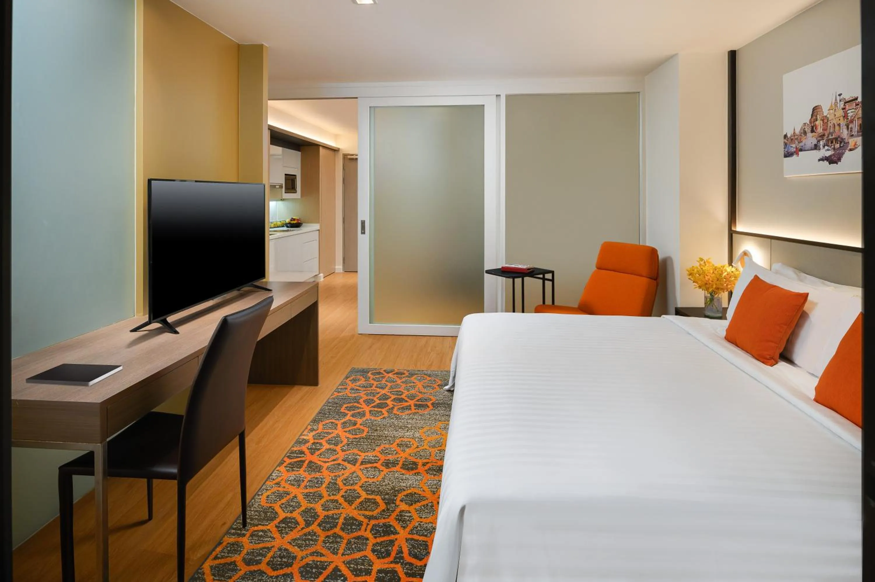 Bed in PARKROYAL Suites Bangkok