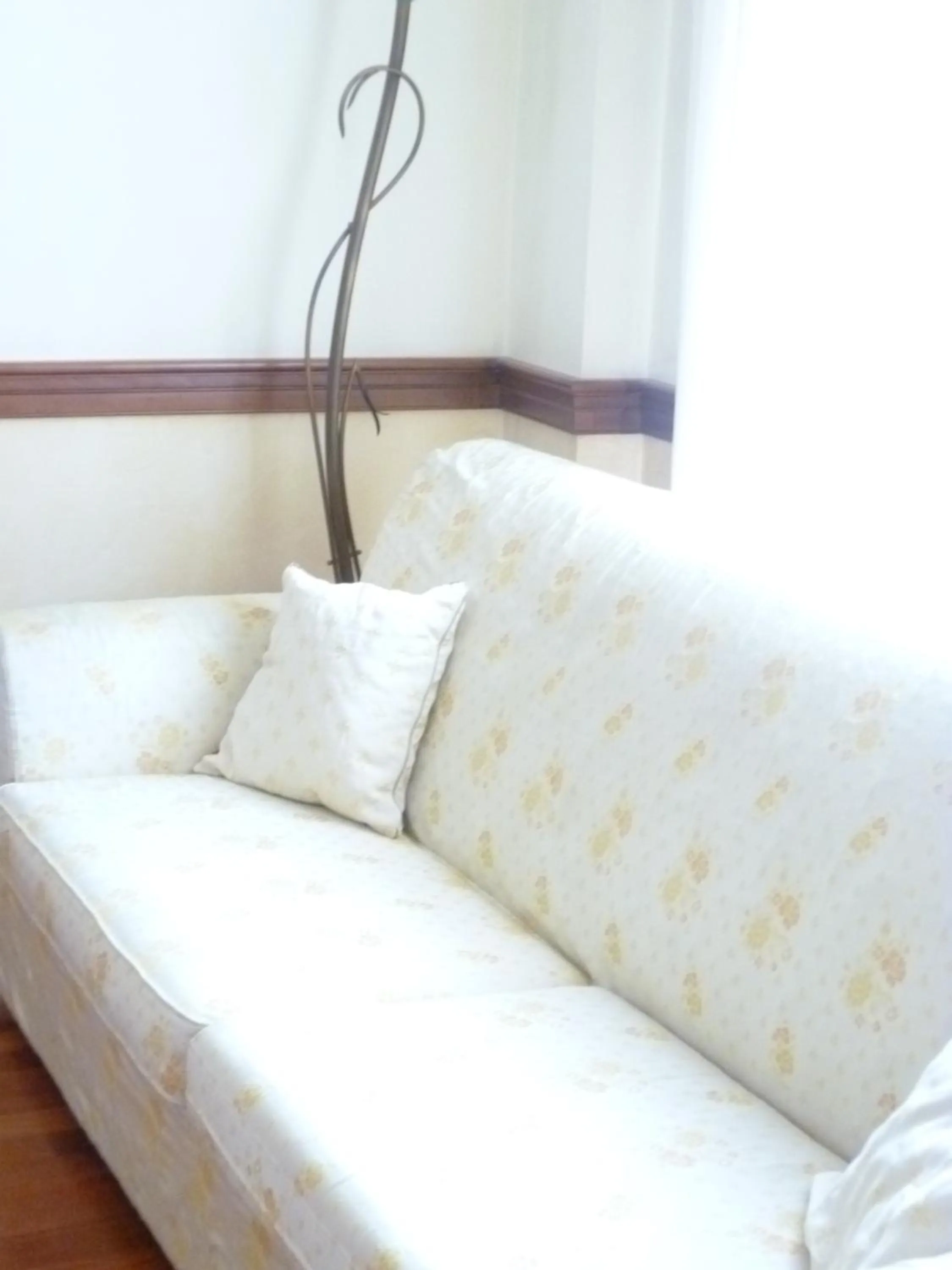 Seating area, Bed in Hotel Minerva