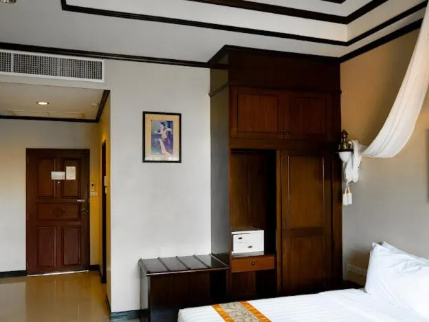 Bed in Kanok Buri Resort