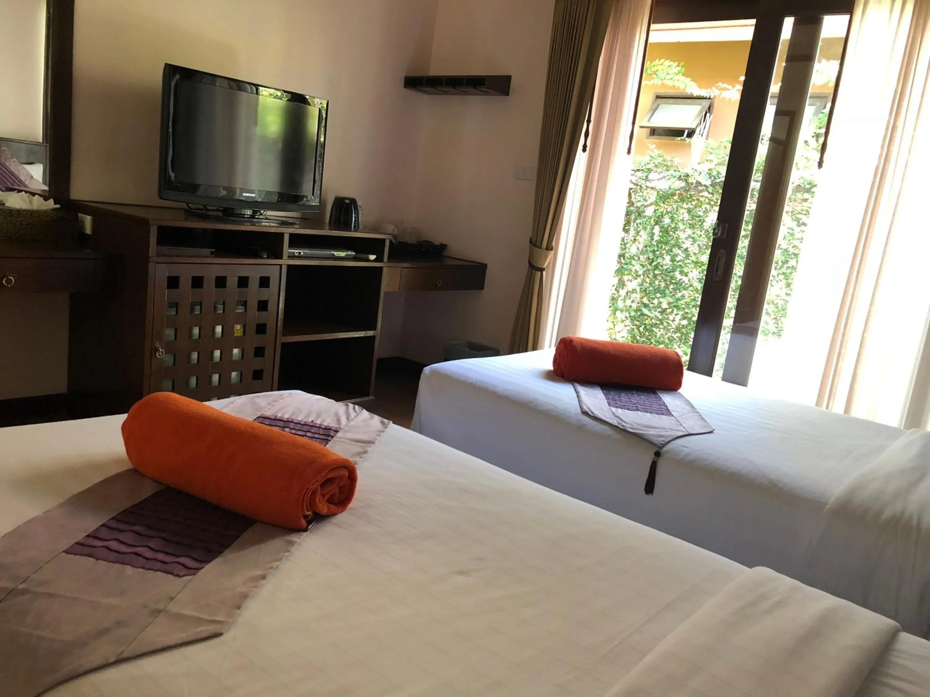 Photo of the whole room, Bed in Kanok Buri Resort