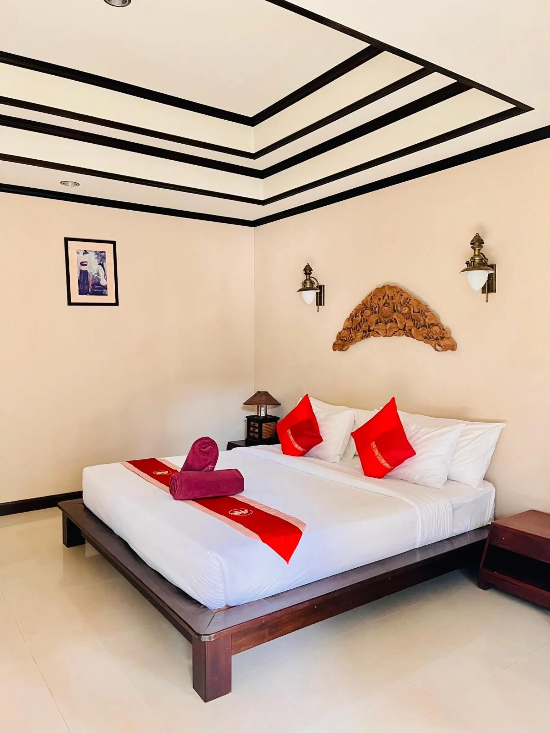 Bed in Kanok Buri Resort