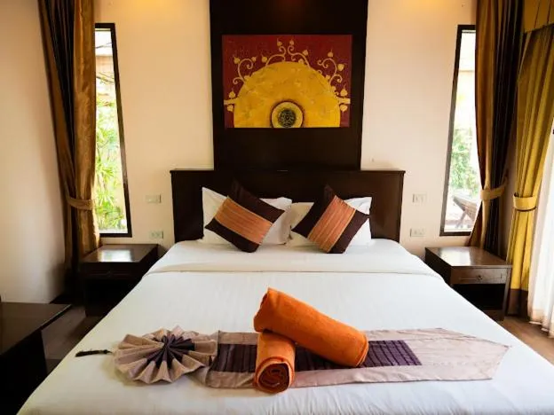 Bed in Kanok Buri Resort
